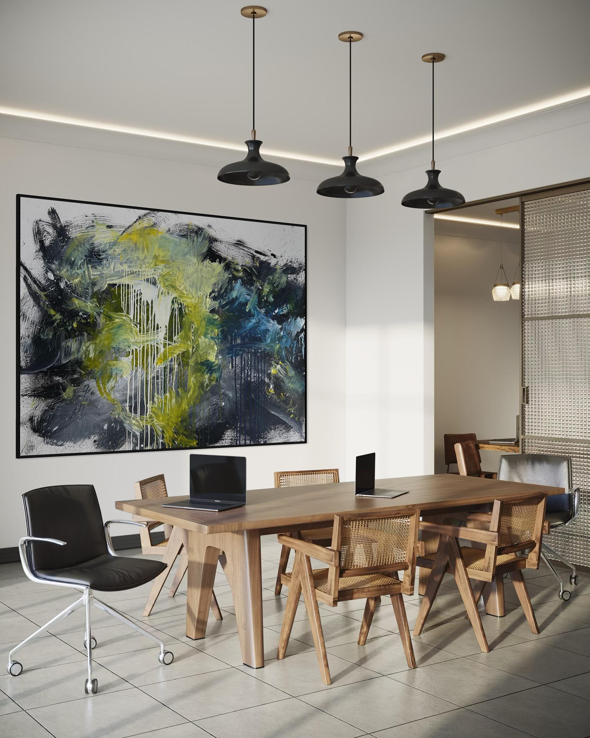 Modern office conference room with wooden table, chairs, and abstract art on the wall.