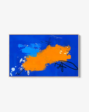A framed canvas featuring an abstract design with vibrant blue and orange colors, with brush strokes visible.