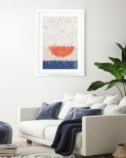 Living room with a white sofa, blue pillows, and a colorful abstract painting on the wall.