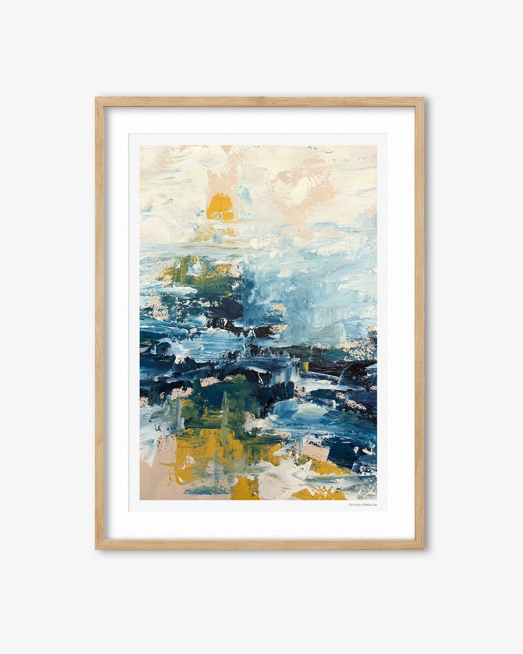 Abstract art print with blue and yellow tones in a wooden frame on a white background