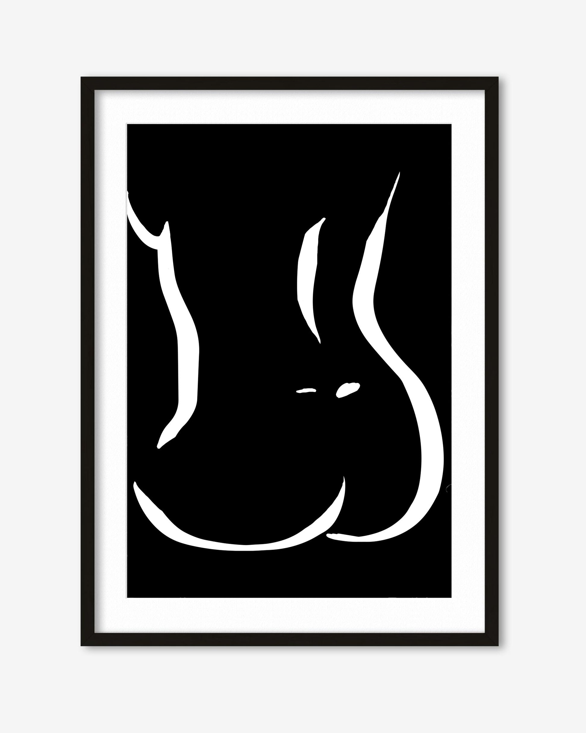 Framed artwork of a stylized black and white abstract design on a white background