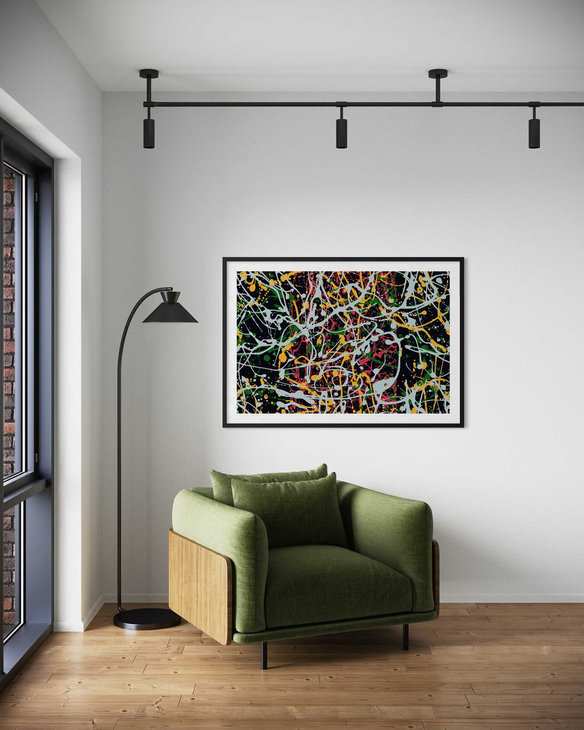 Modern living room with a green armchair, colorful abstract painting, and floor lamp.