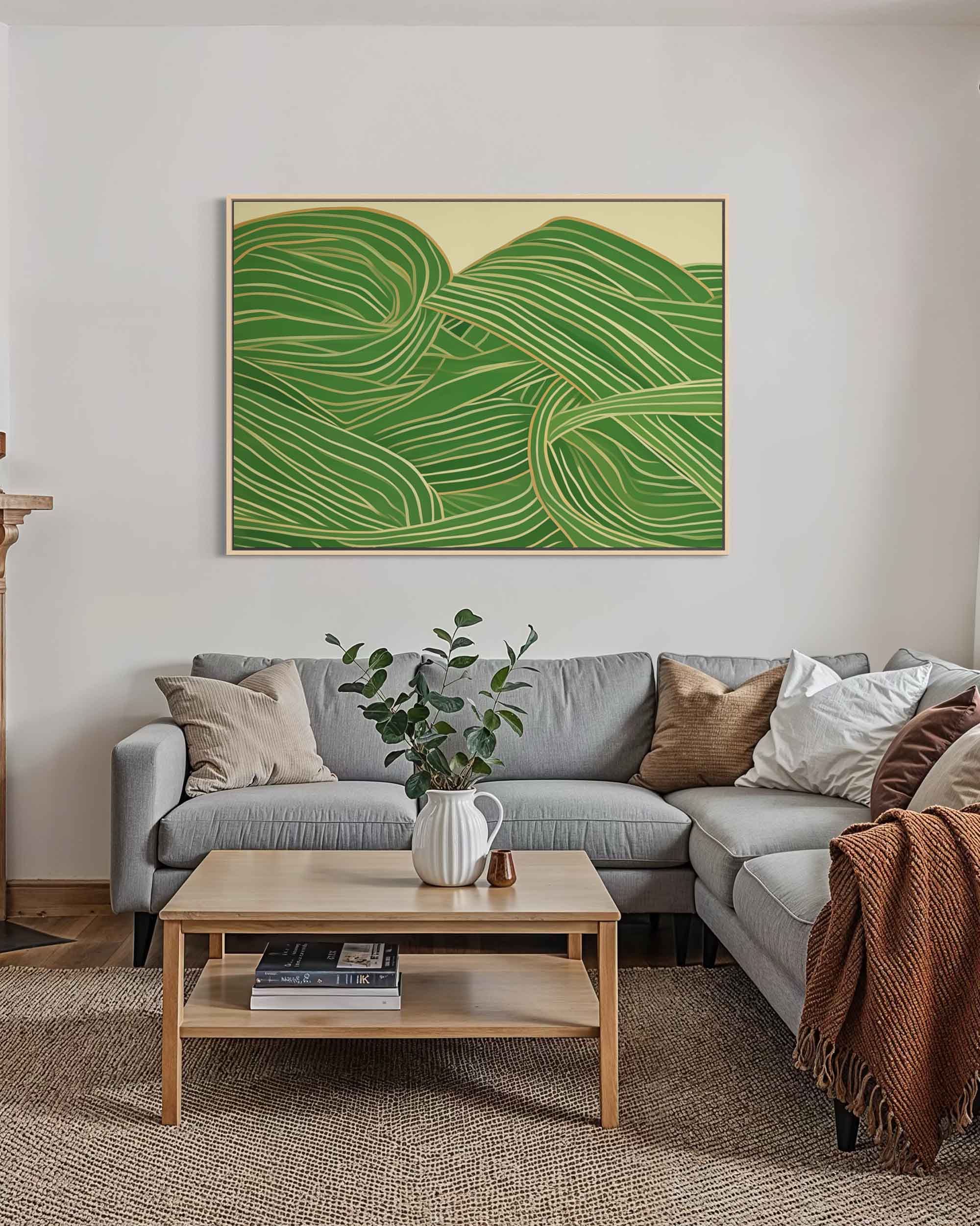 Living room with a gray sectional sofa, wooden coffee table, and green abstract art on the wall.