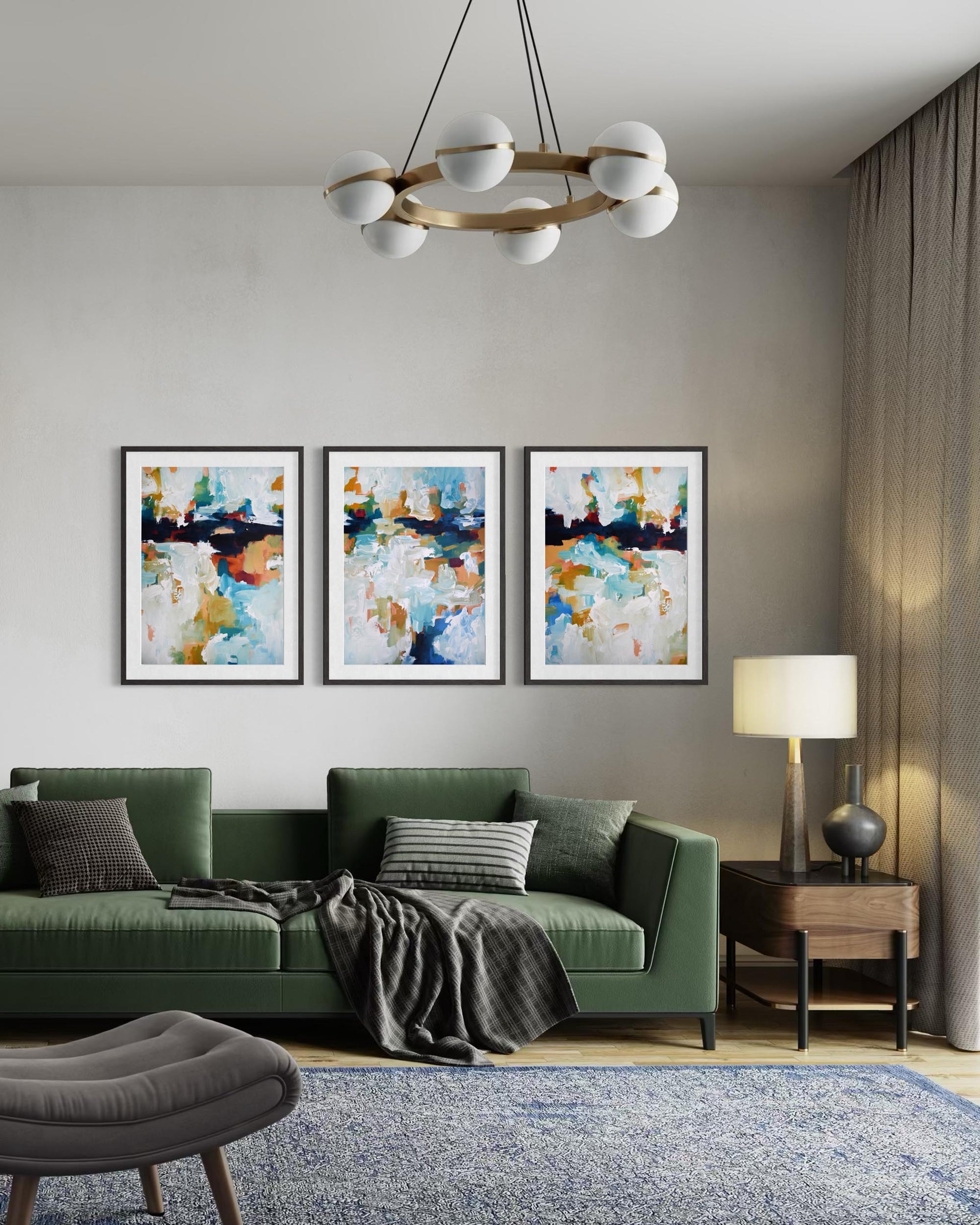 Modern living room with a green sofa, abstract art, and a lamp.