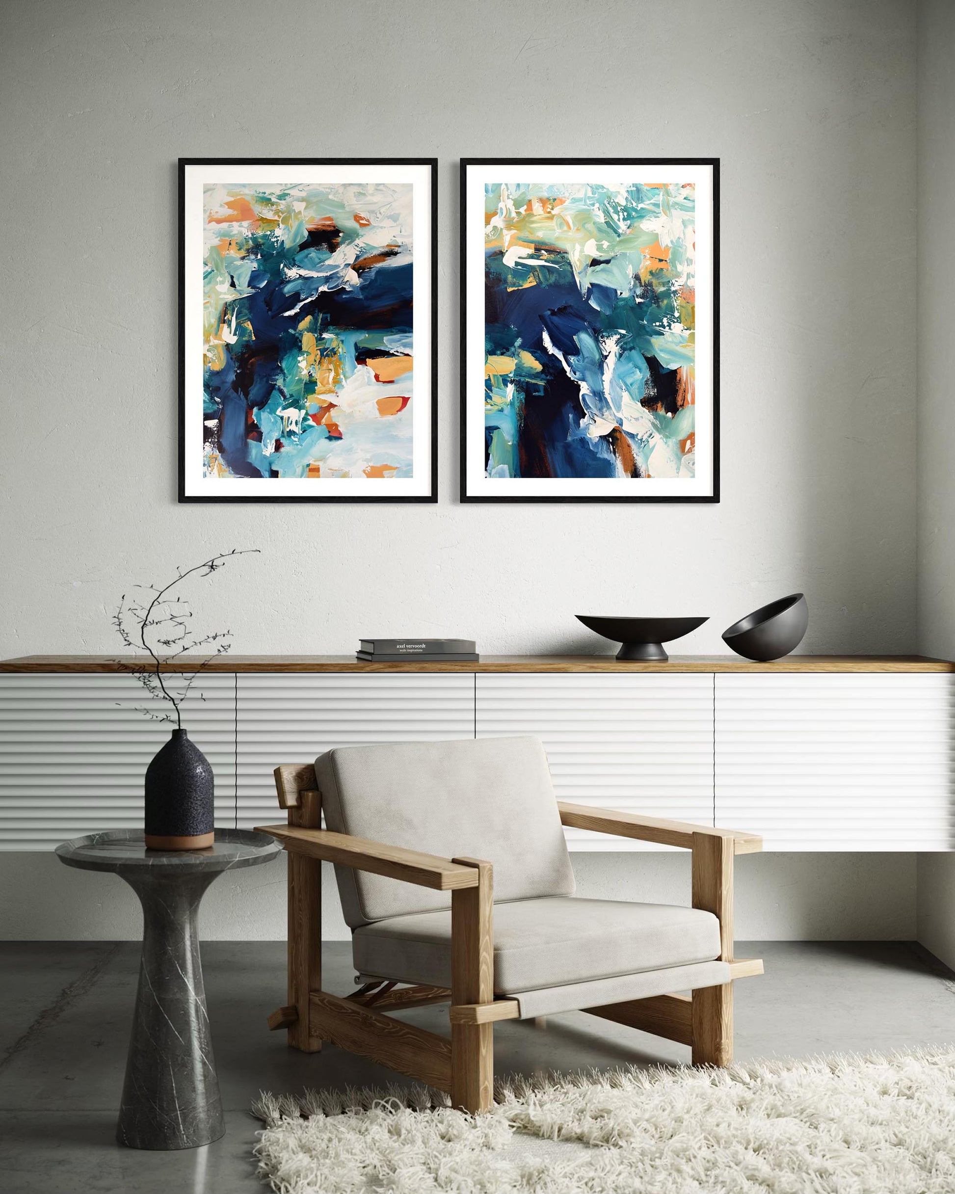 Modern interior with abstract art on the wall and a chair in the foreground.