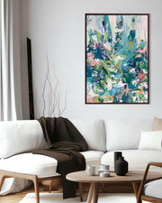 Modern living room with a colorful abstract painting on the wall.