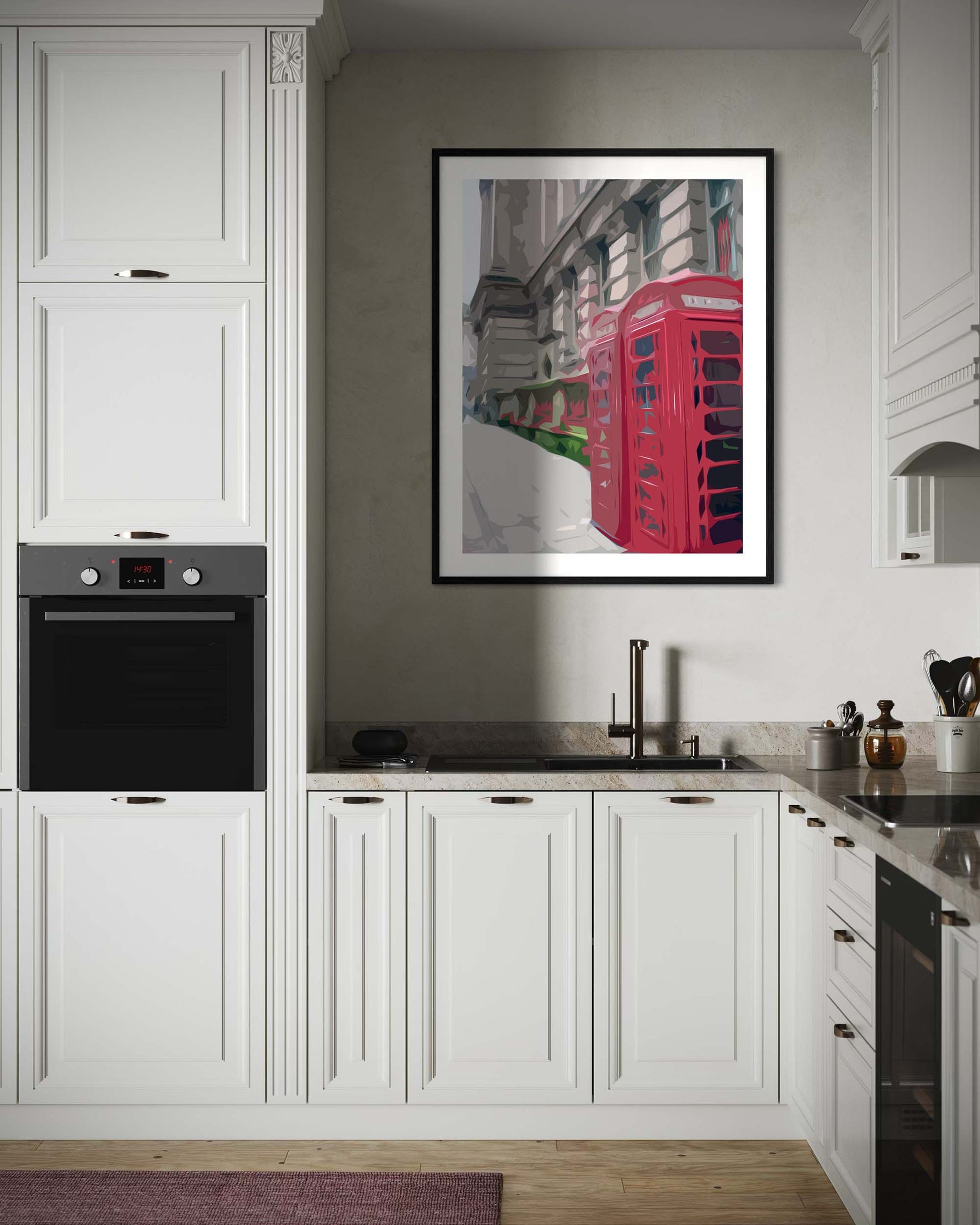 Modern kitchen with white cabinets, black appliances, and a framed picture on the wall.