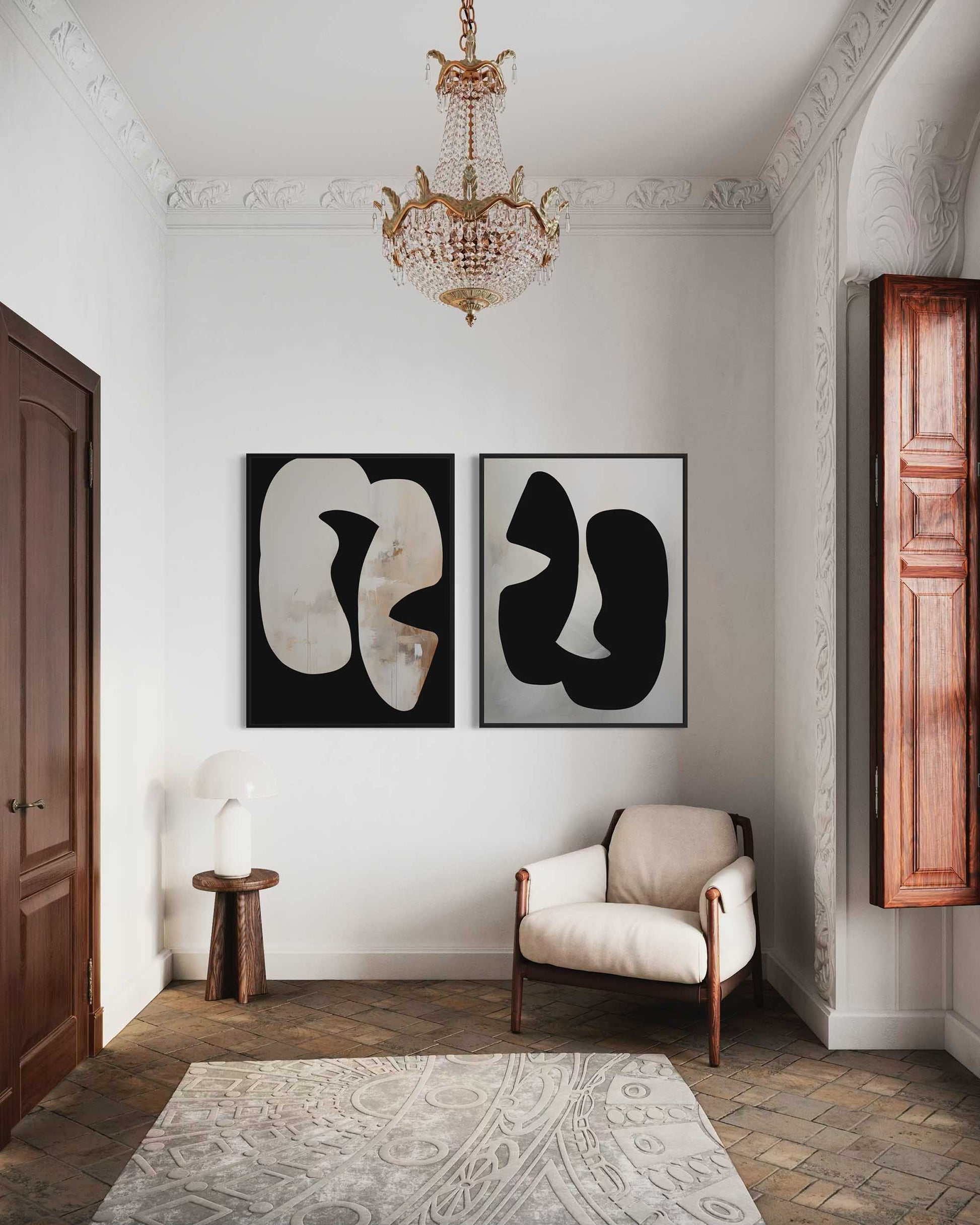 Living room with abstract art on the wall, a chandelier, and a chair.