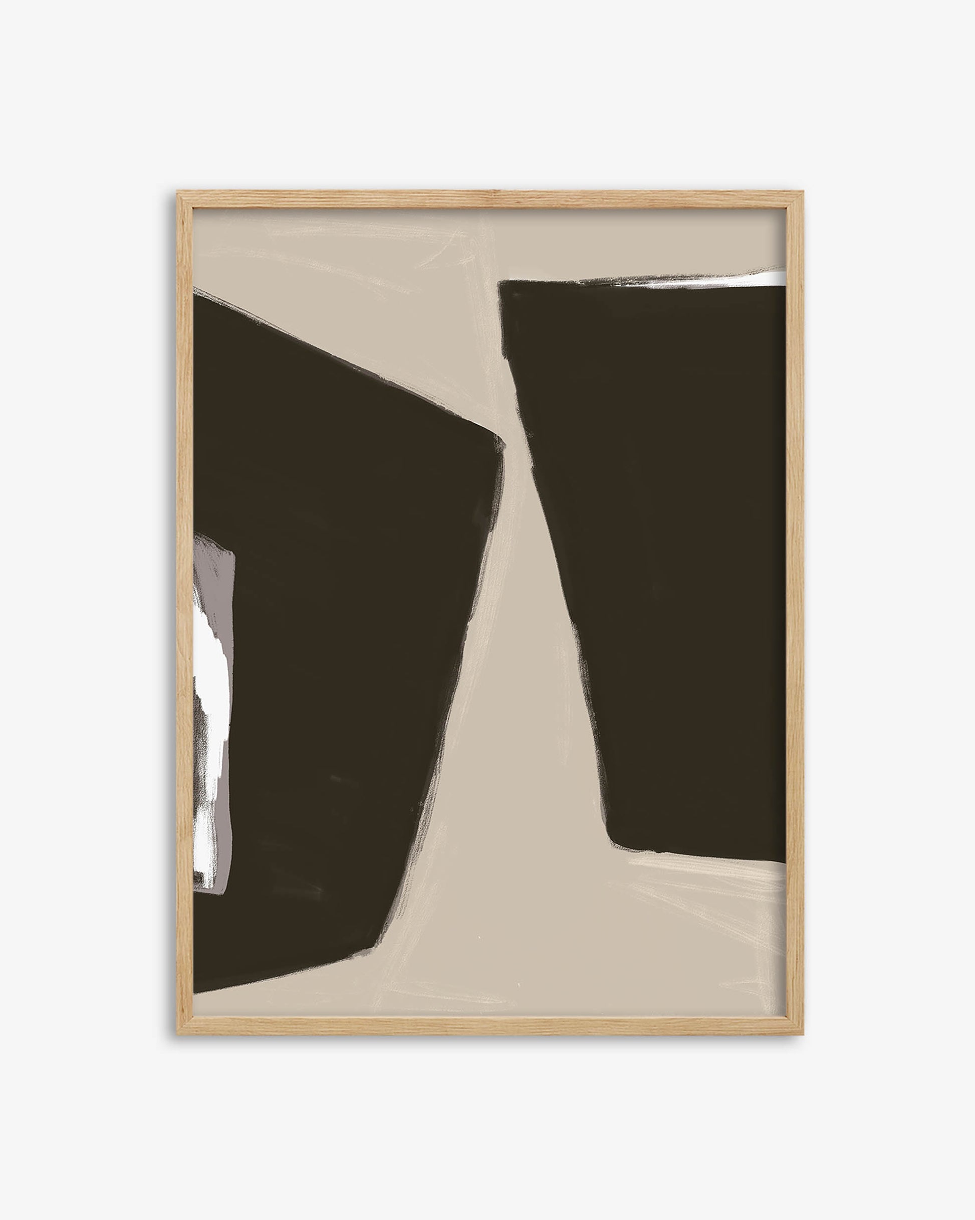 Framed abstract art with black and brown shapes on a beige background