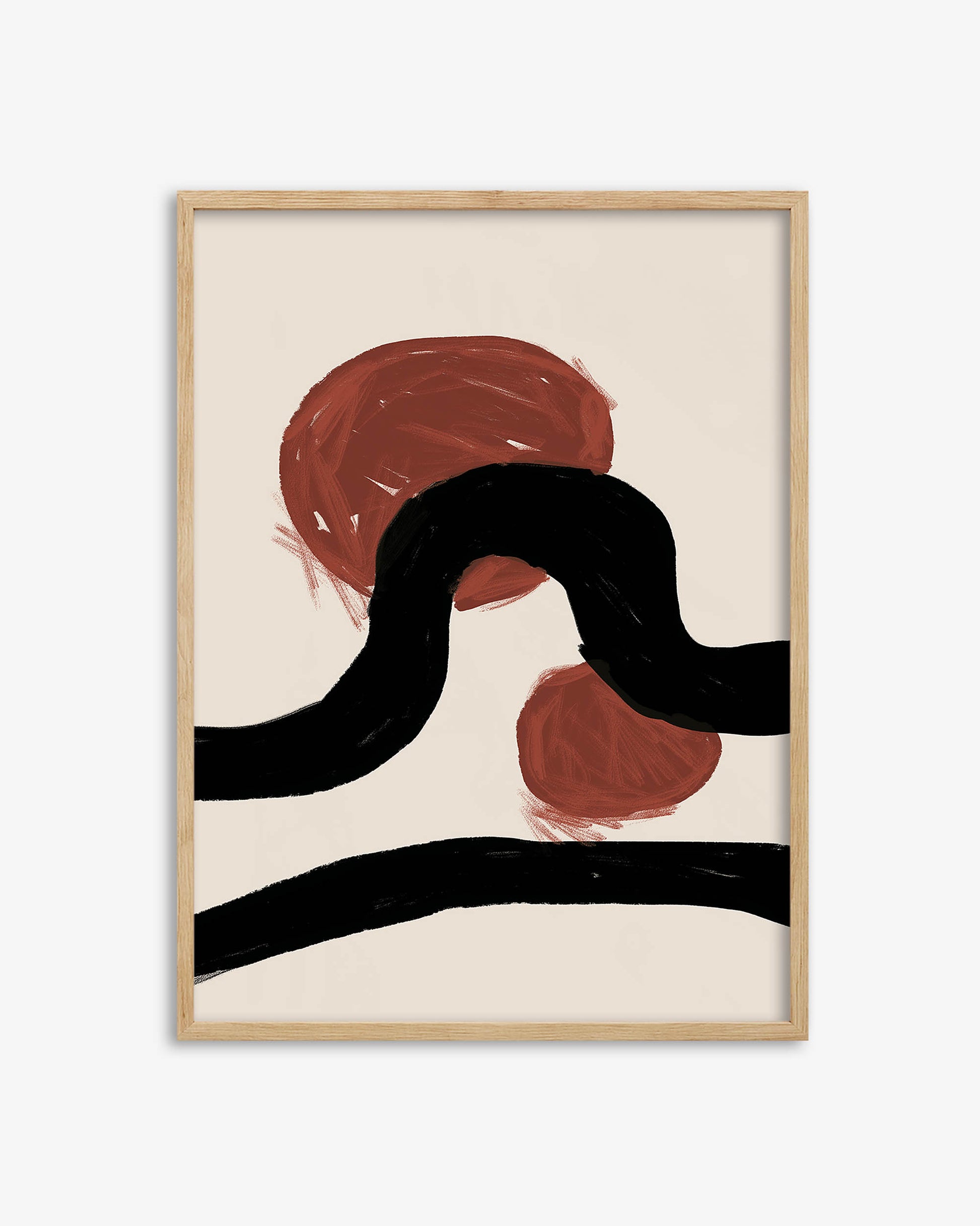 Abstract art print with red and black shapes in a wooden frame on a white background