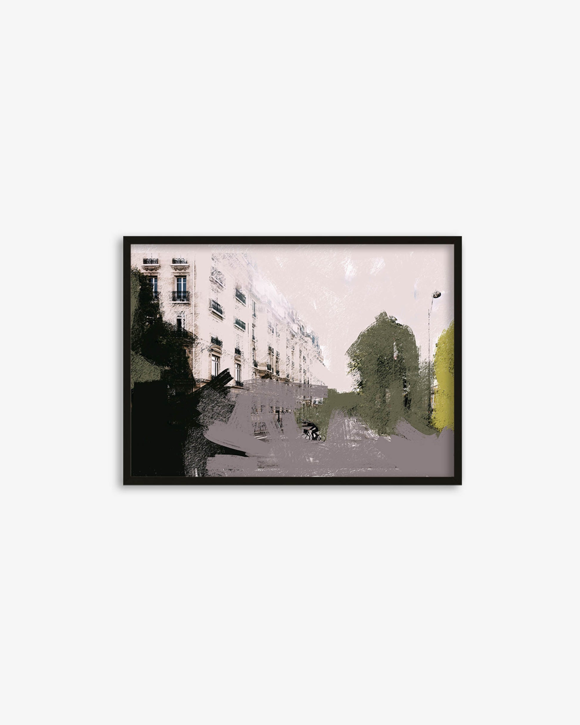 Framed artwork of a city street scene with buildings and trees on a white background