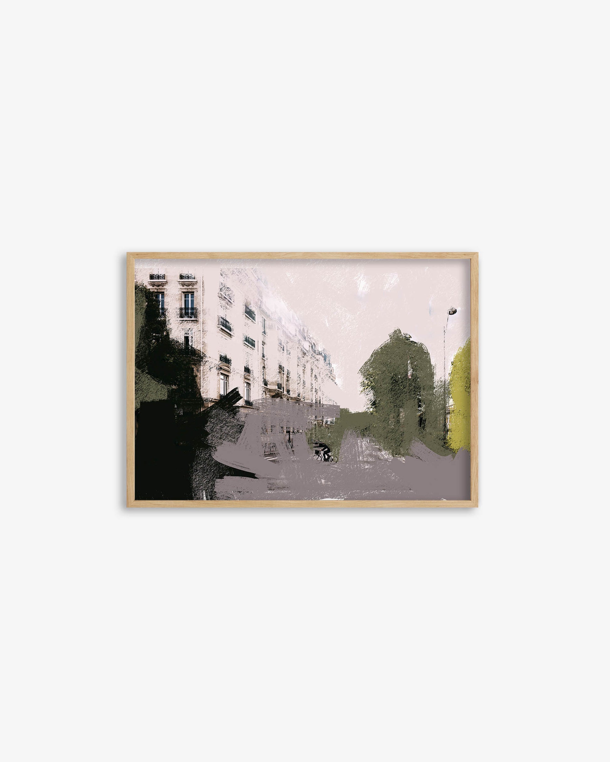 Framed artwork of a city street scene with buildings and trees on a white background