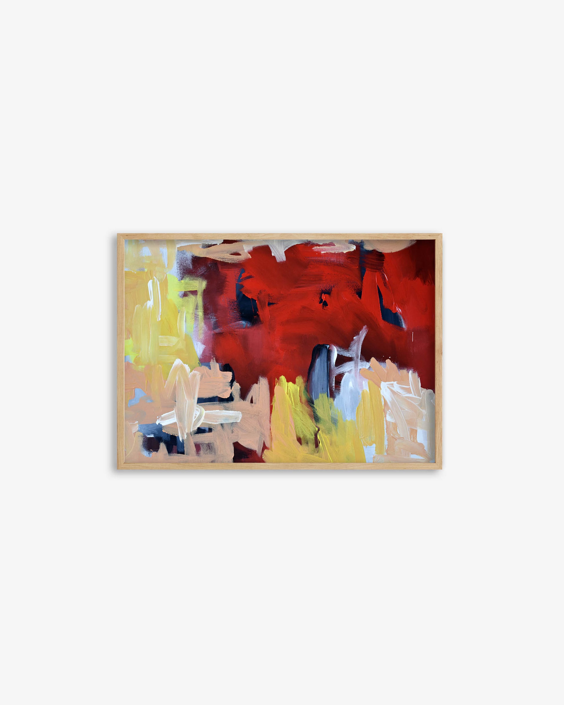 Abstract painting with red and yellow colors on a white wall