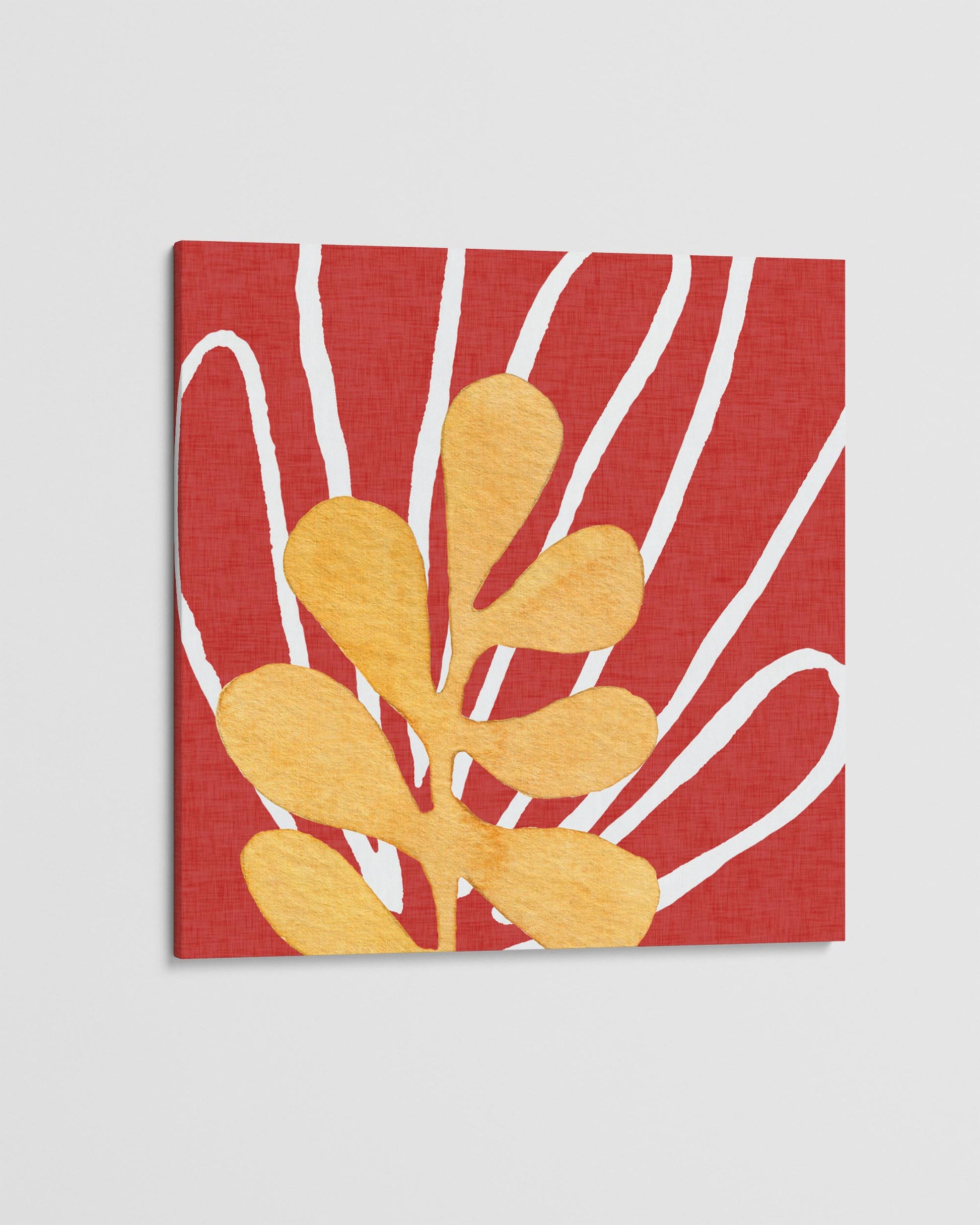 Canvas print with yellow abstract design on a red background