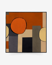 A Mid Century Abstract Framed Canvas with bold geometric shapes in orange, brown, and yellow on a black background, encased in a simple black frame.