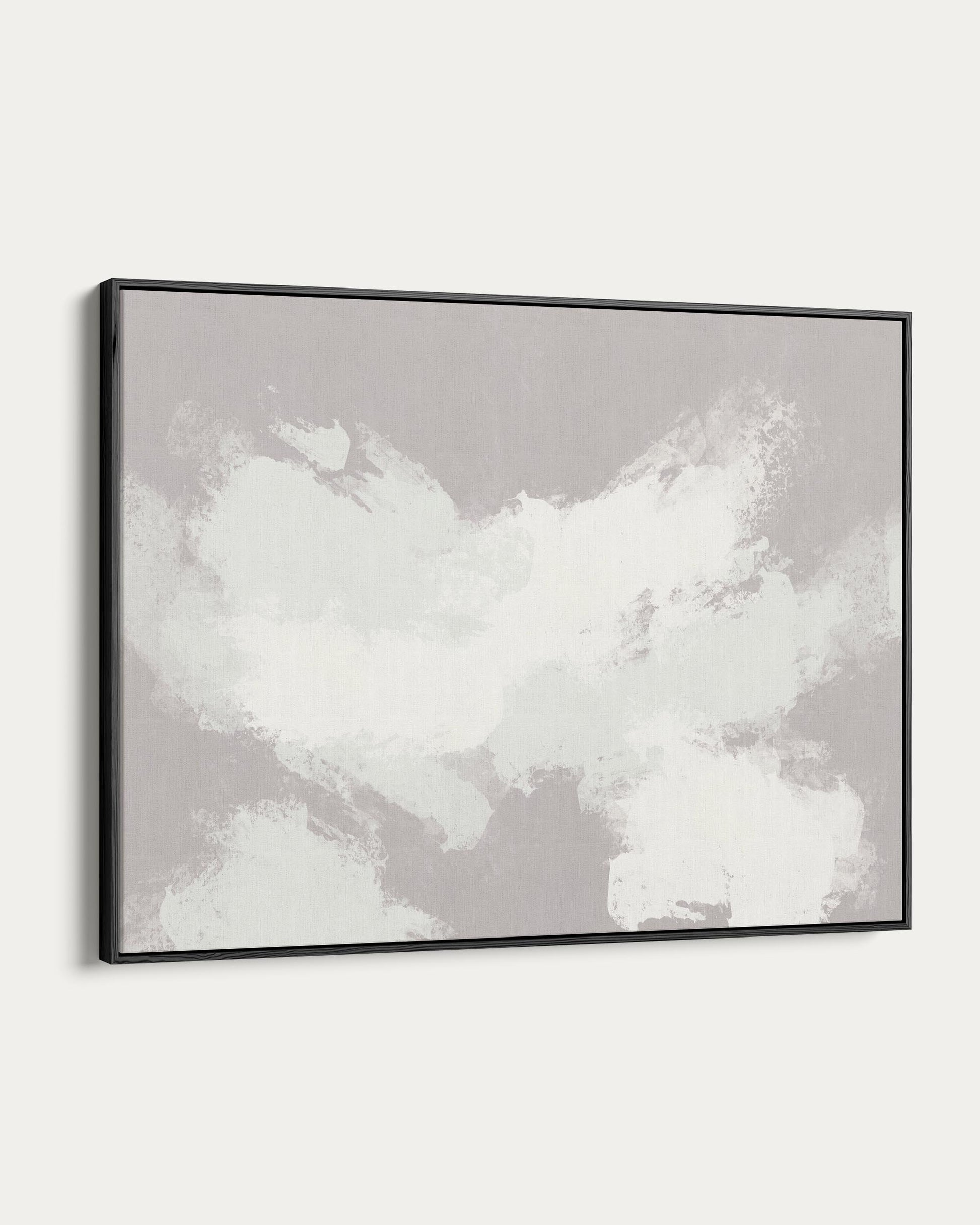 Framed abstract art piece on a white wall