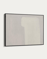 Framed abstract art piece on a white wall
