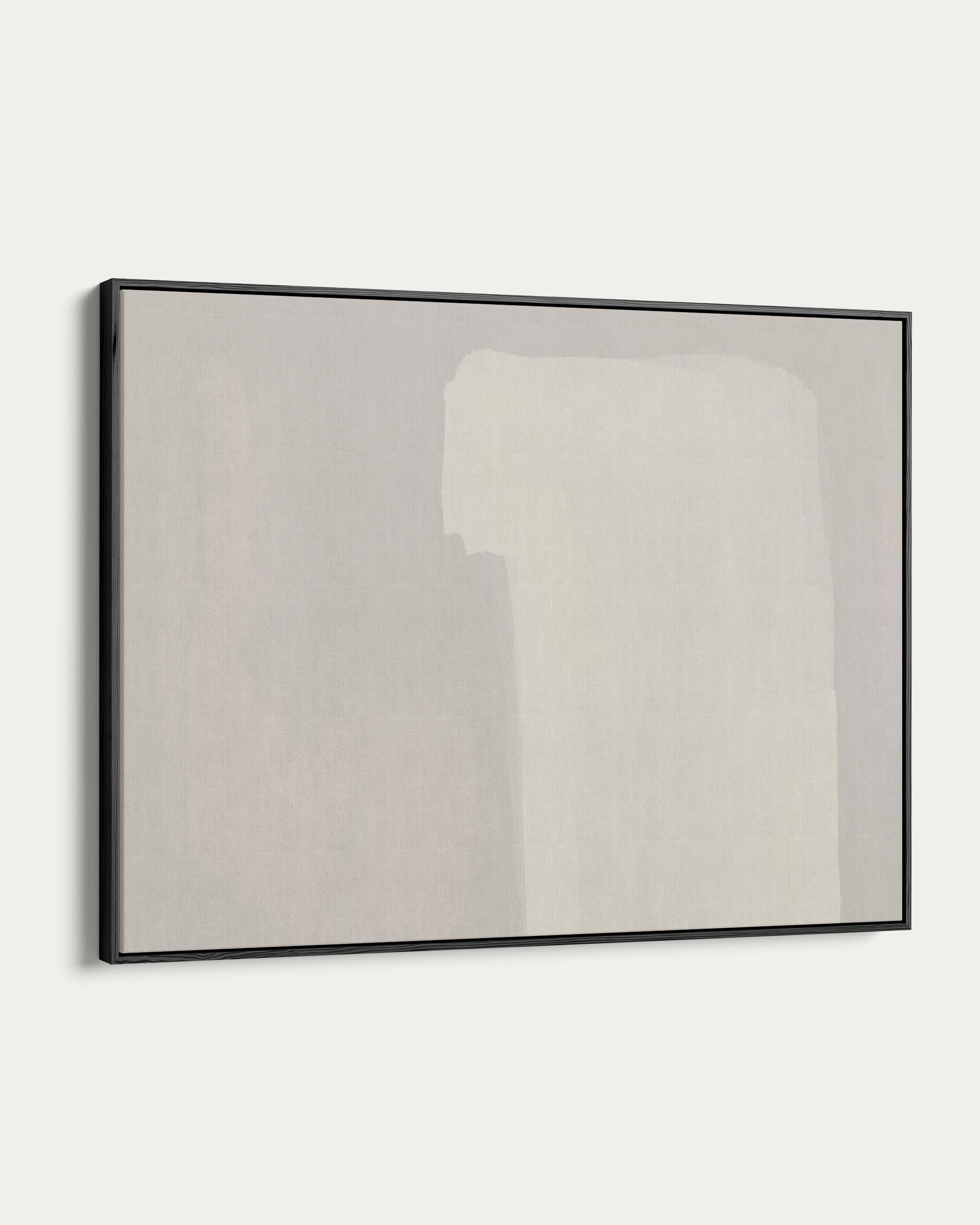 Framed abstract art piece on a white wall