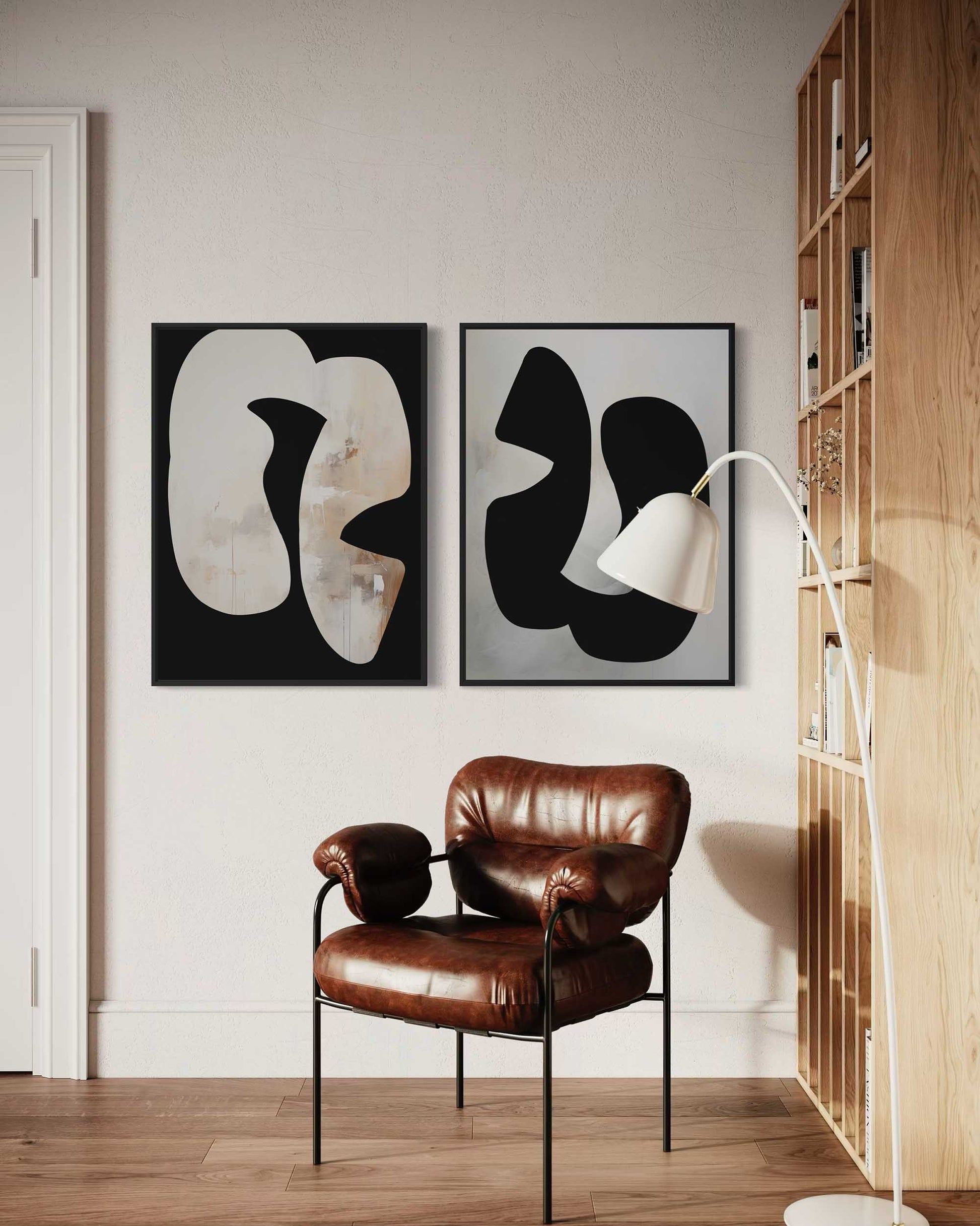 Modern interior with abstract art, brown leather chair, and wooden shelf.