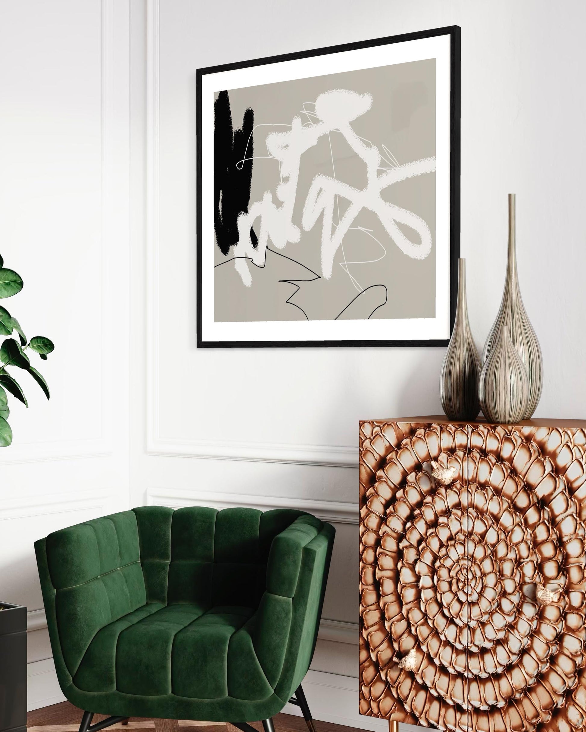 Modern interior with abstract art, green chair, and decorative console table.