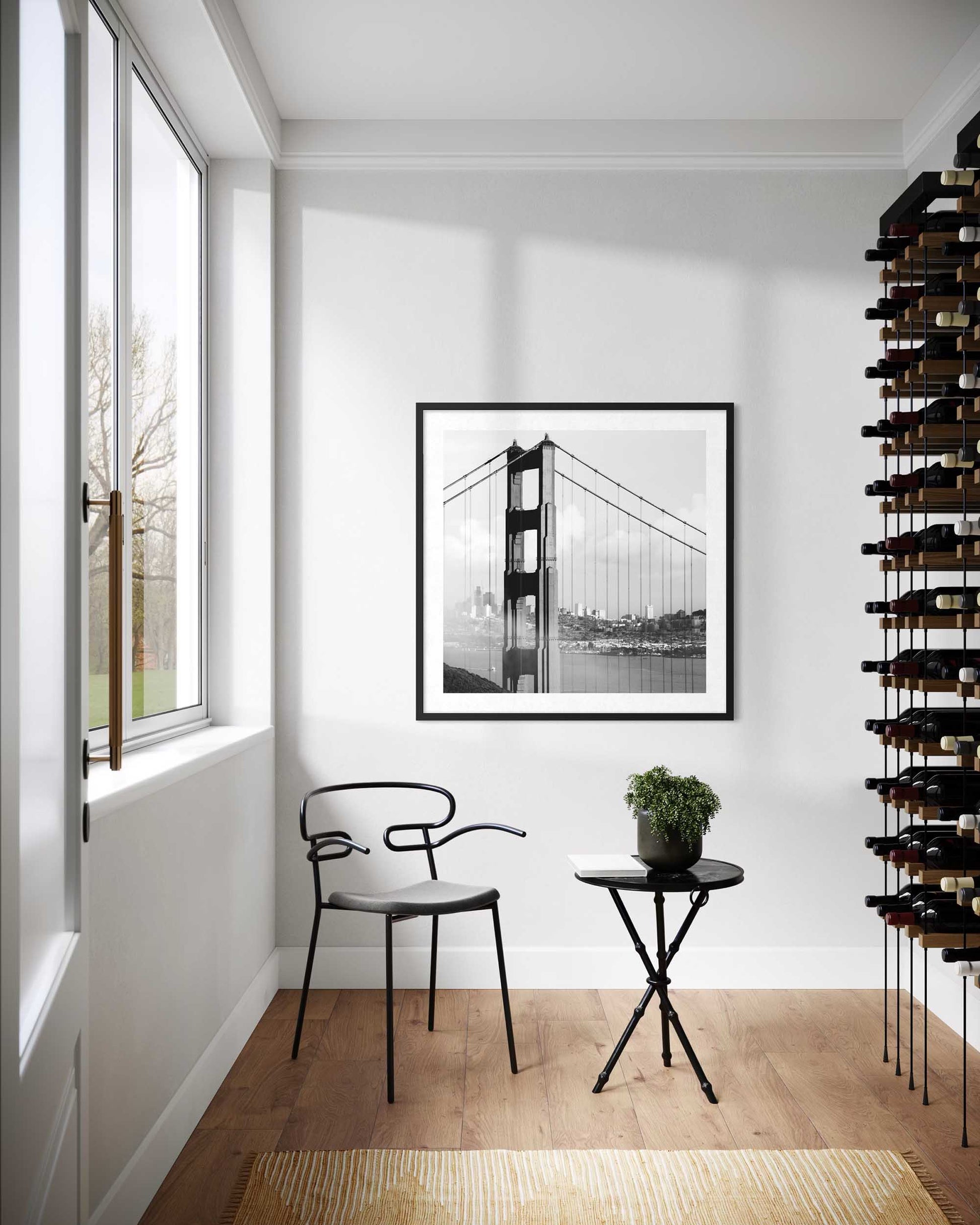 Modern interior with a chair, small table, and wine rack against a white wall.