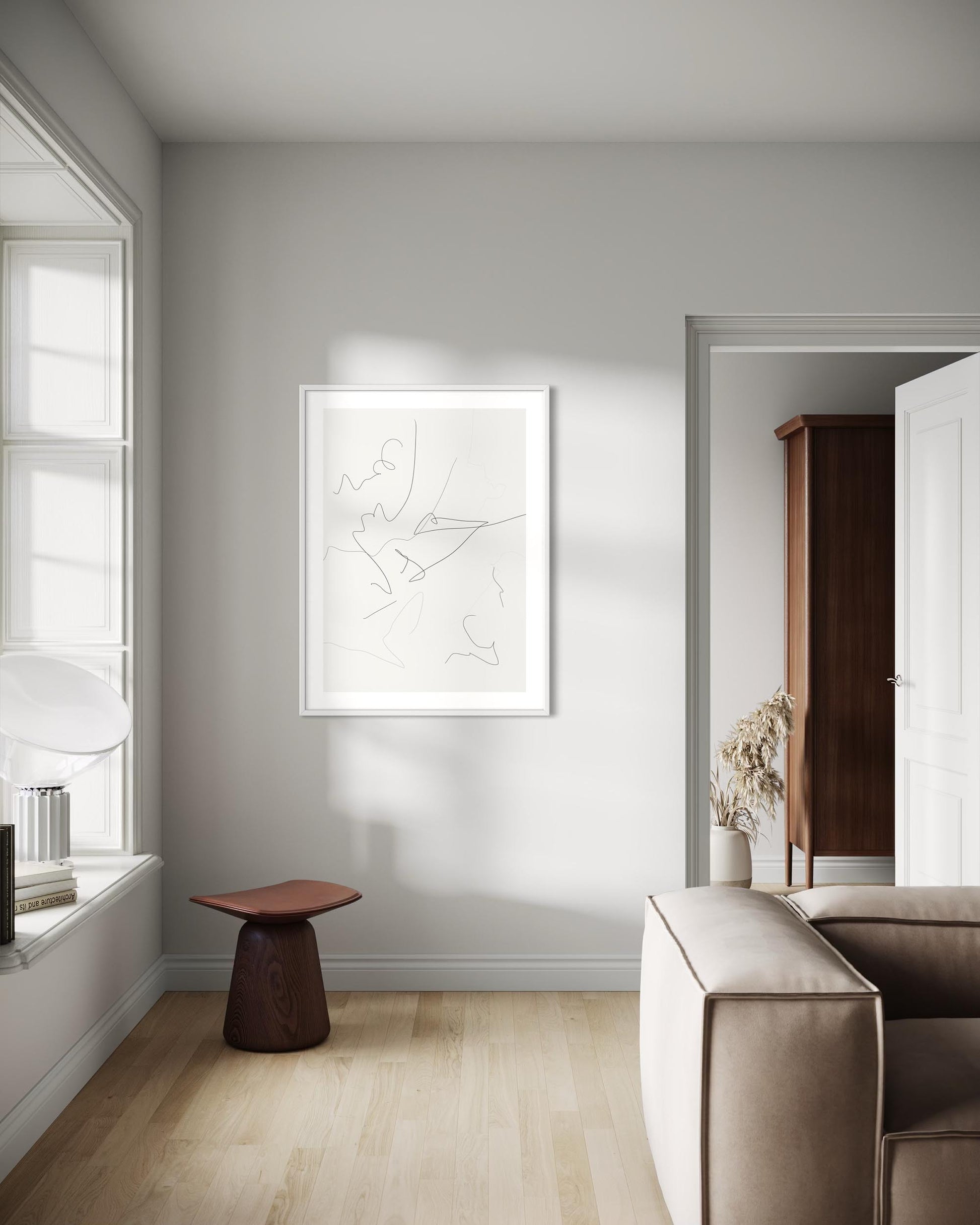 framed abstract line art print on wall in modern living room