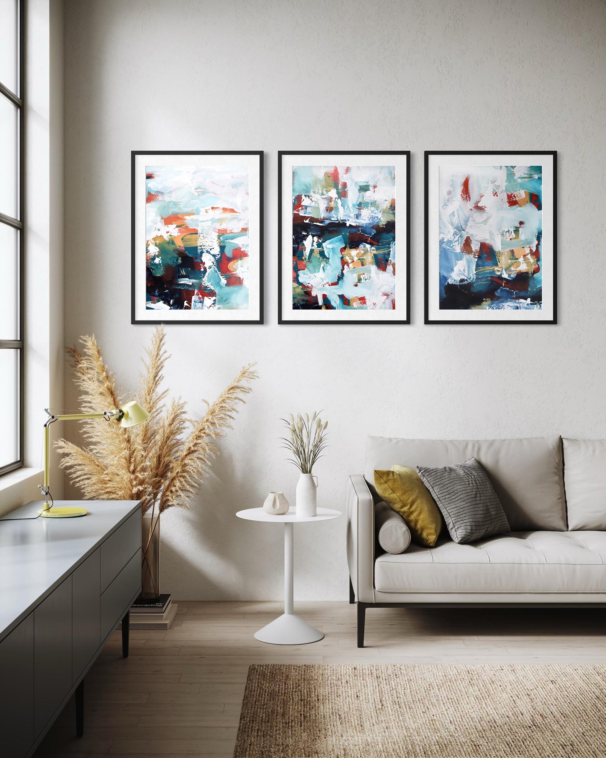 Modern living room with abstract art on the wall and a sofa.