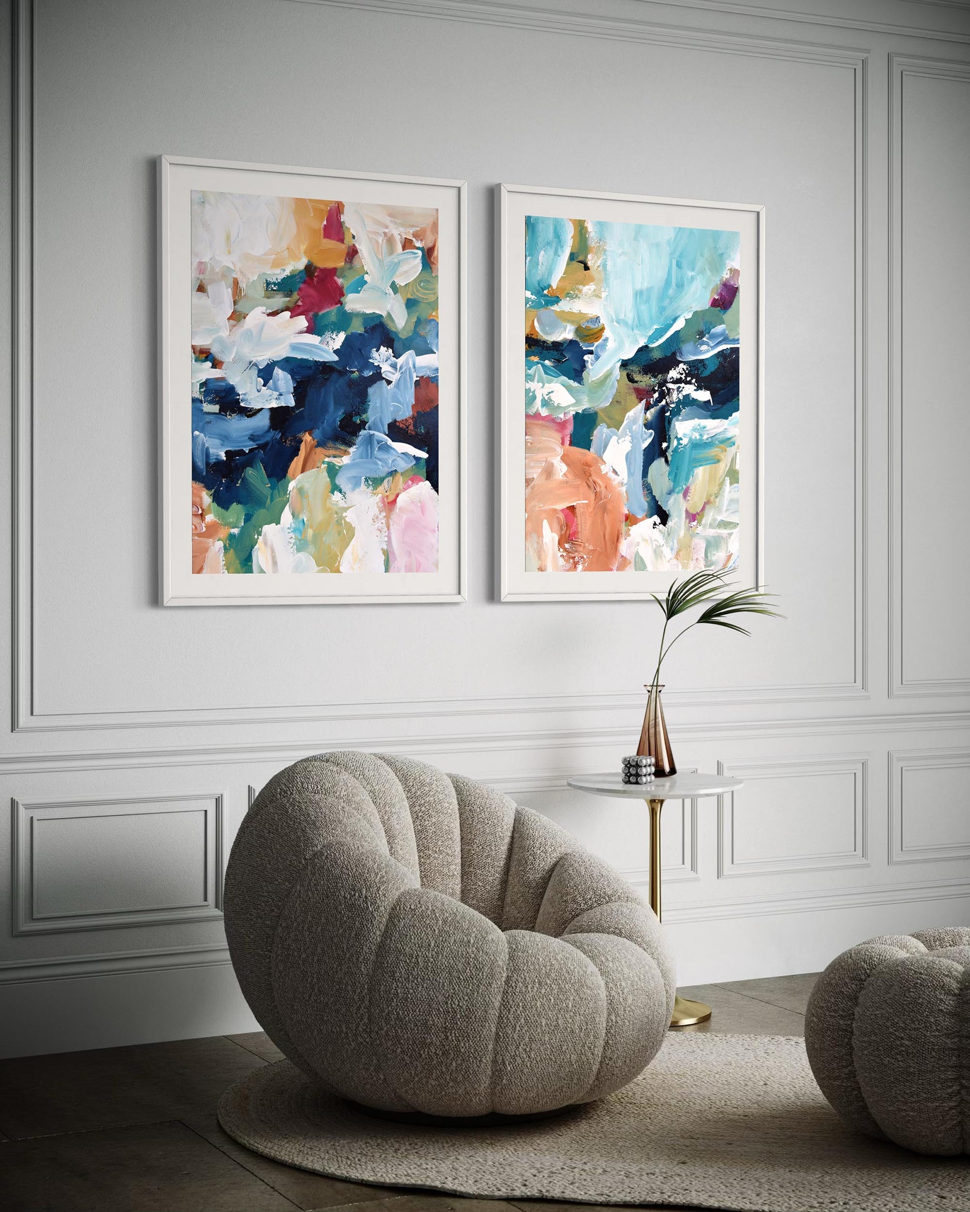 Modern living room with abstract art on the wall and a cozy chair.