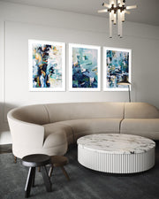 Modern living room with a beige sectional sofa, marble coffee table, and abstract art on the wall.