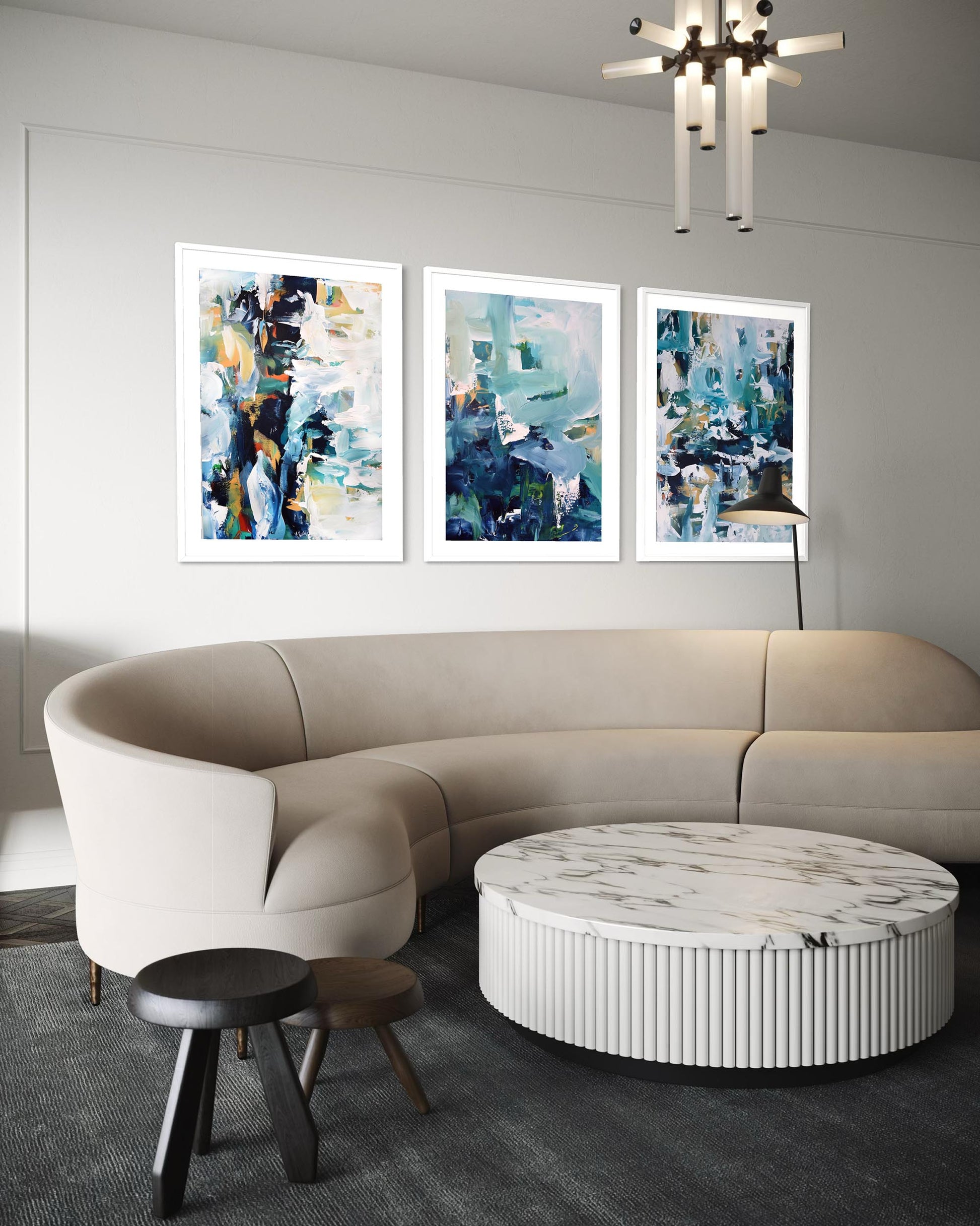 Modern living room with a beige sectional sofa, marble coffee table, and abstract art on the wall.