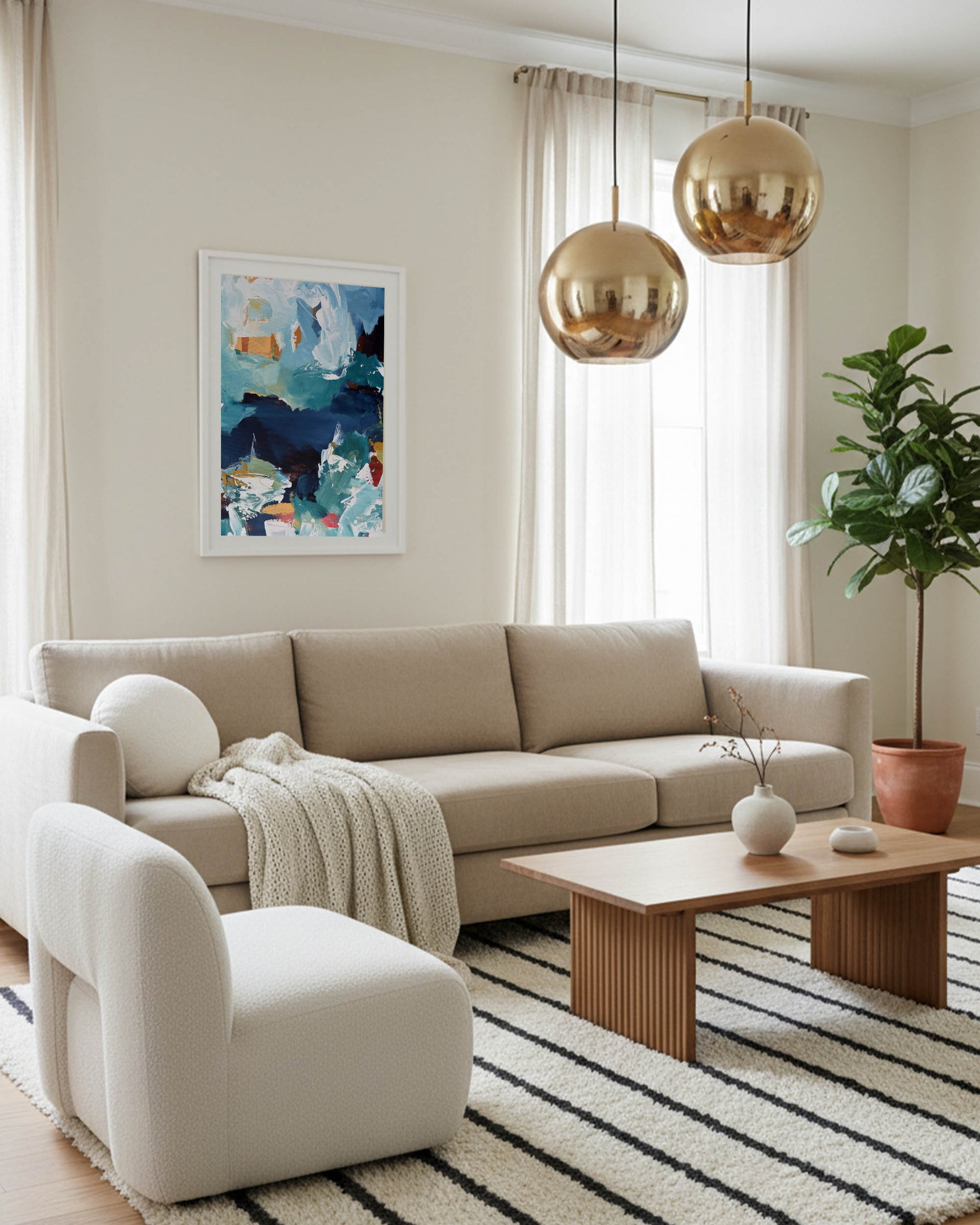 Modern living room with beige sofa, armchair, coffee table, and decorative elements.