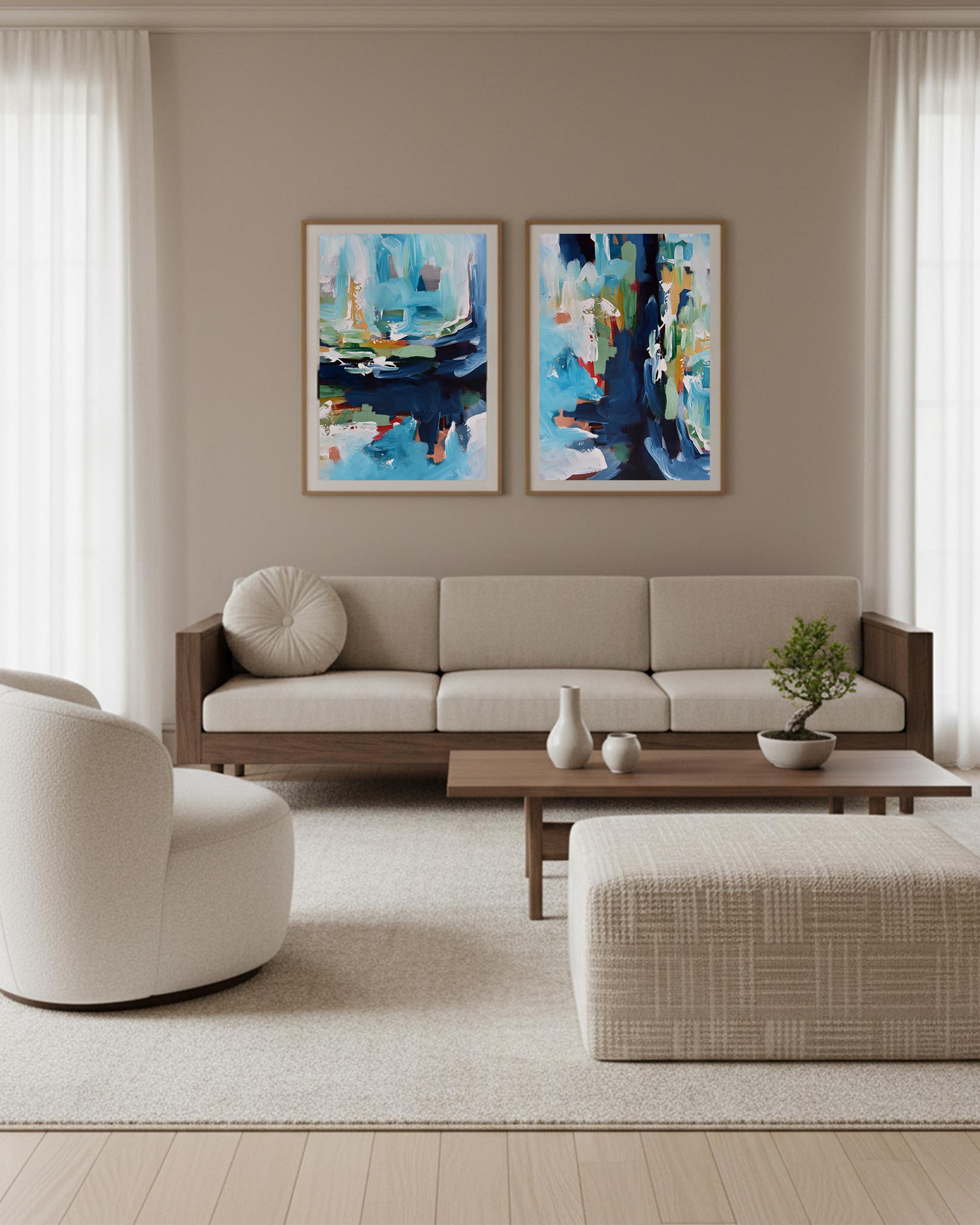 Modern living room with a beige sofa, armchair, and abstract art on the wall.