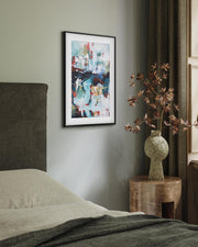 framed abstract art print in a modern bedroom