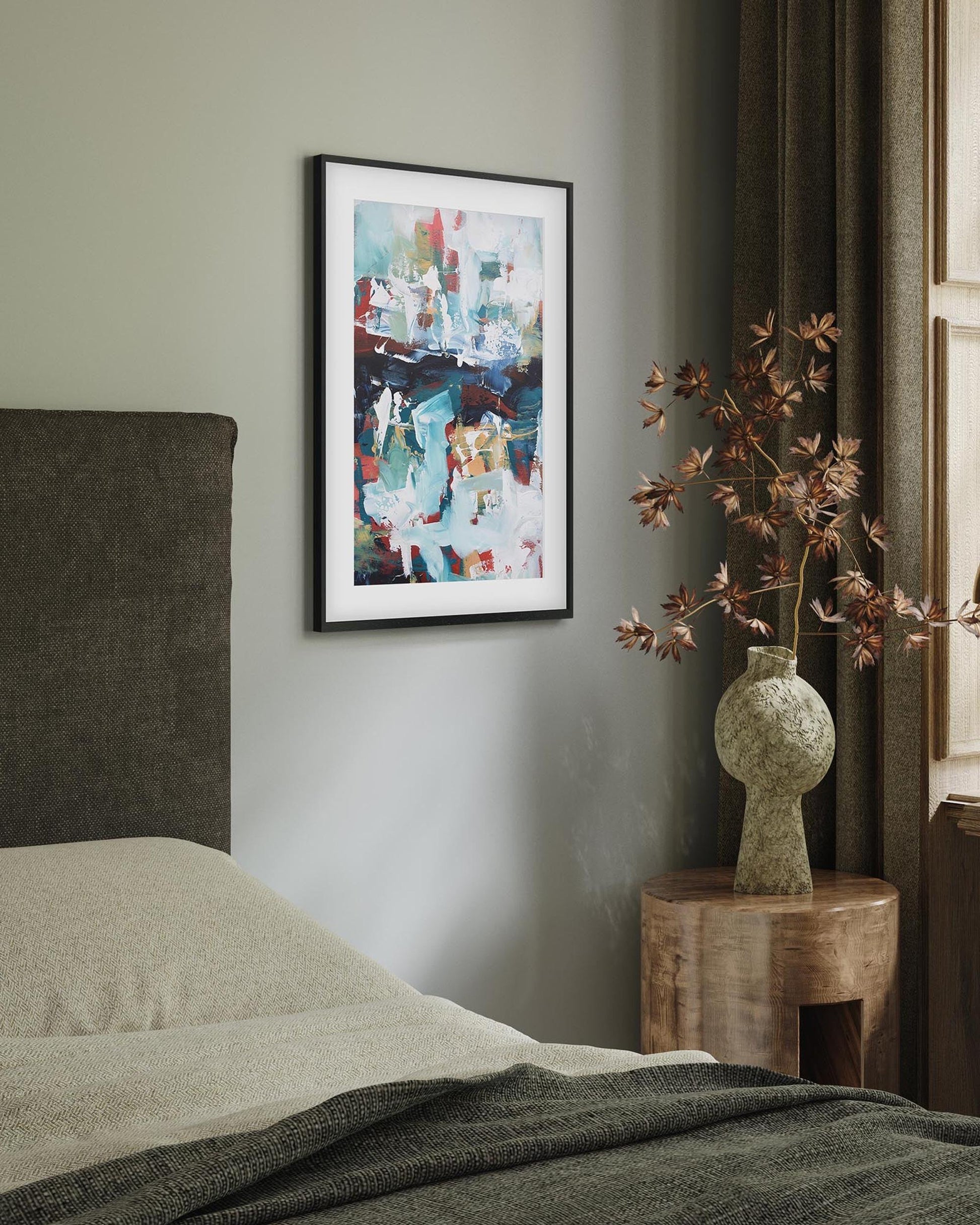 framed abstract art print in a modern bedroom