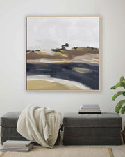 Abstract landscape painting on a wall above a bench with a plant to the side.