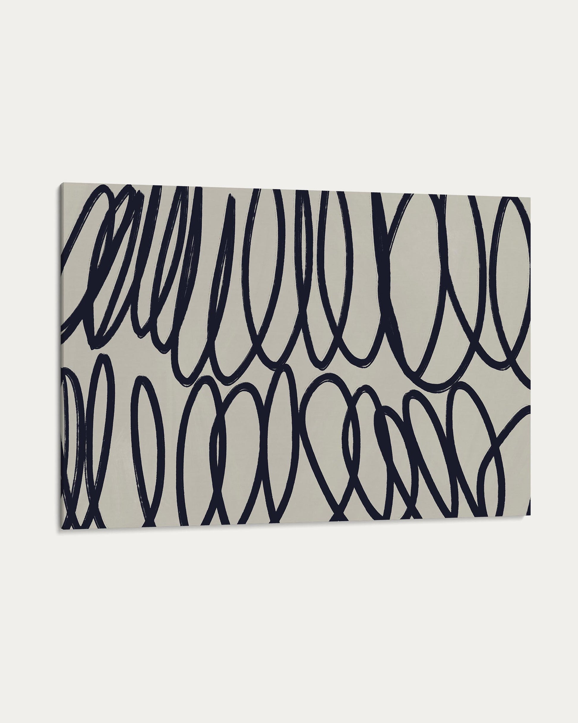 Rectangular mat with black abstract pattern on a beige background