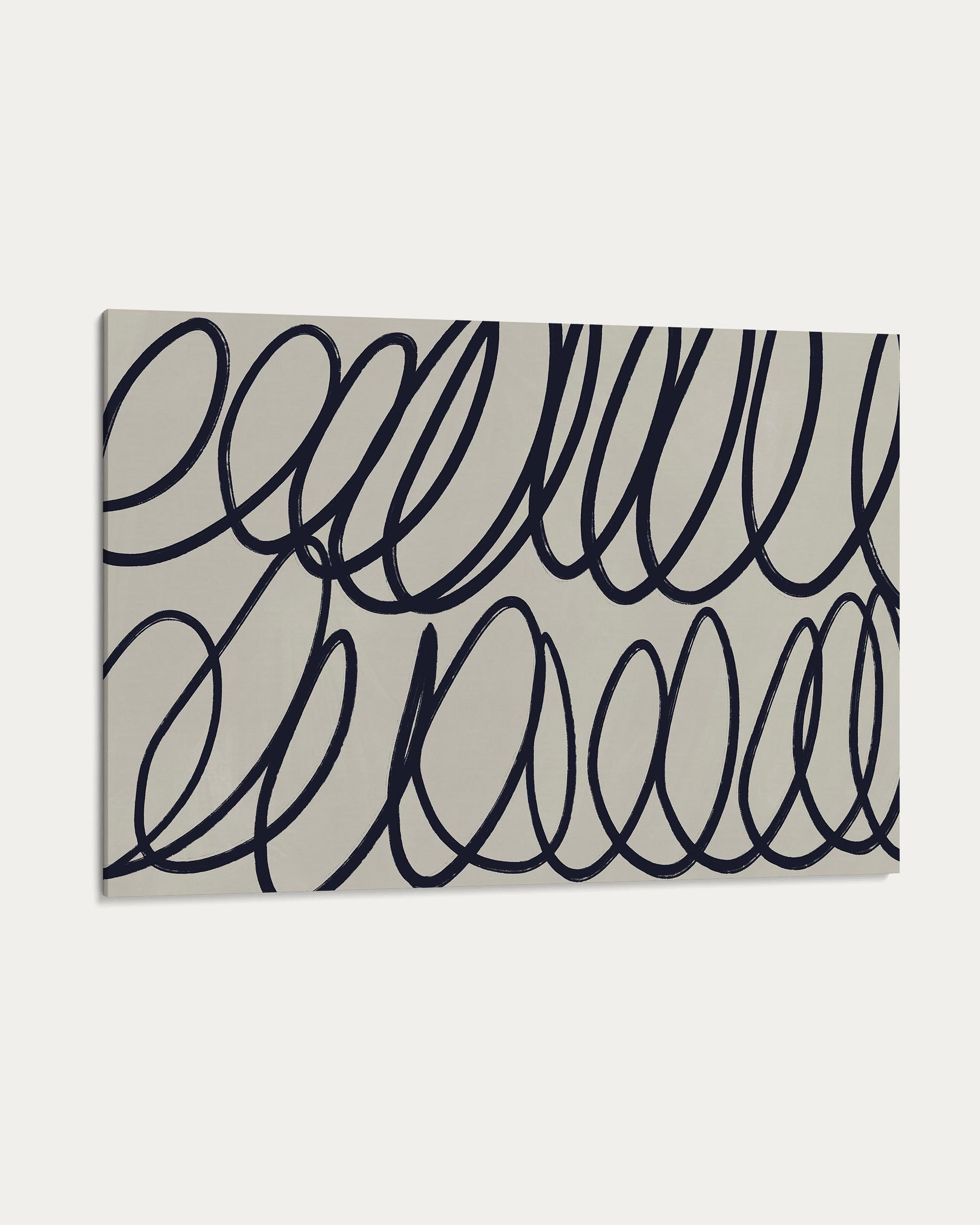 Rectangular mat with black wavy line pattern on a beige background