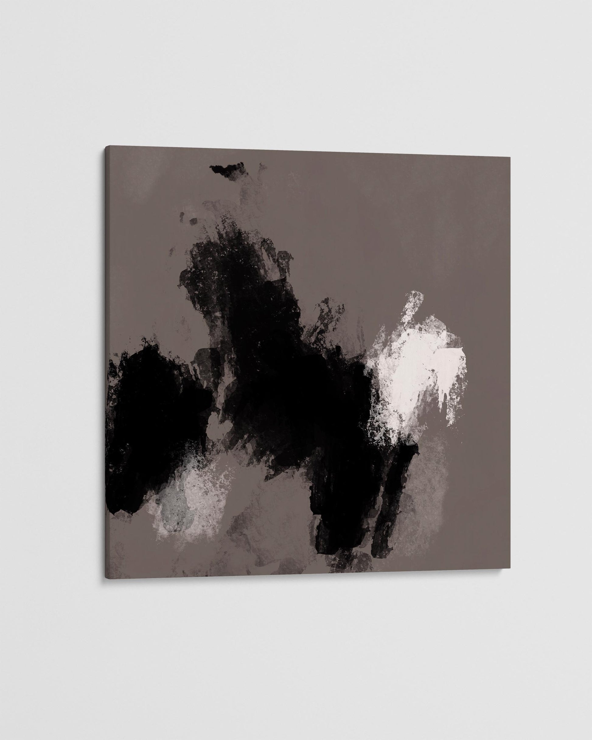 Abstract art piece with black and white brush strokes on a gray background
