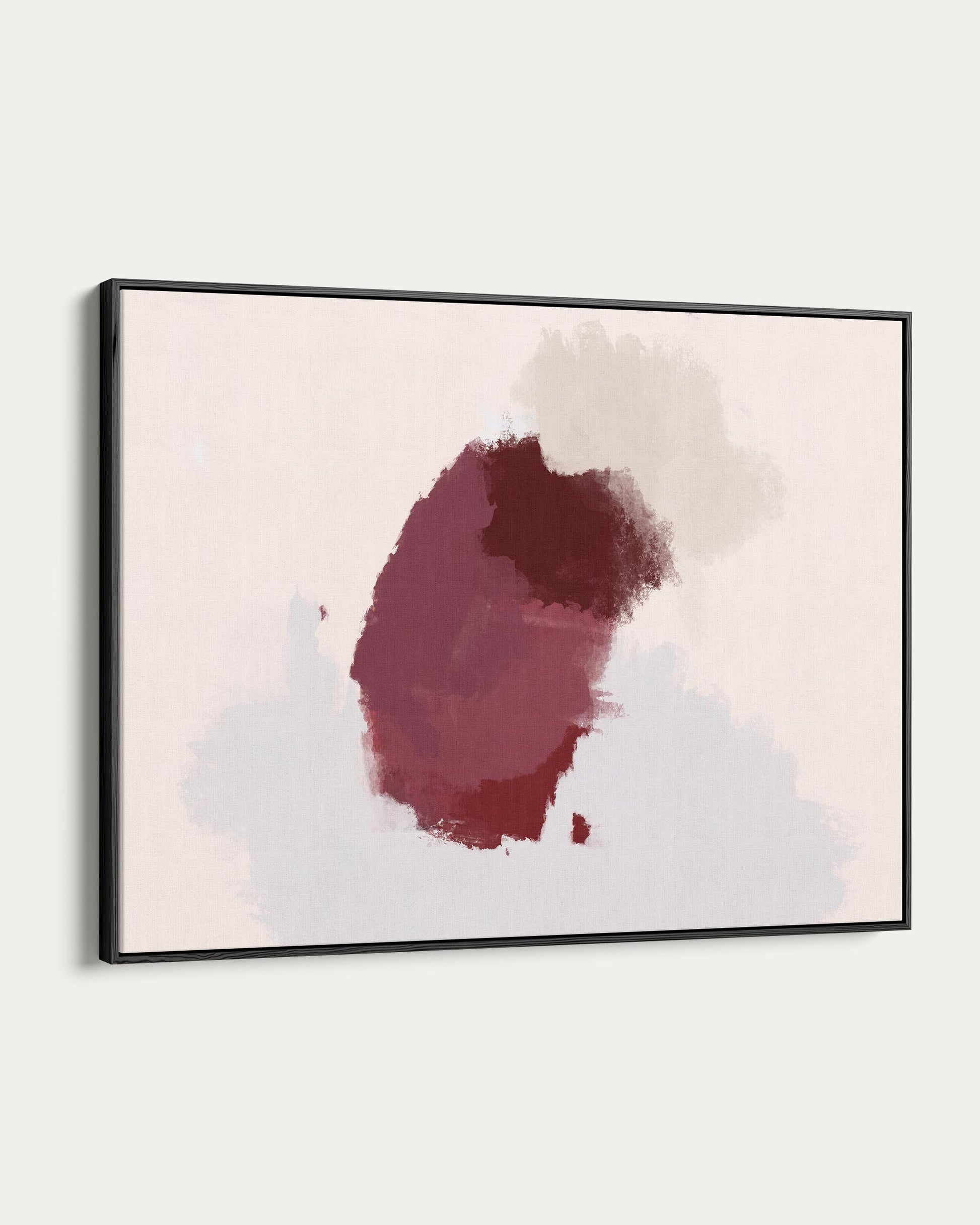 Abstract art piece with a red and black splash on a light background