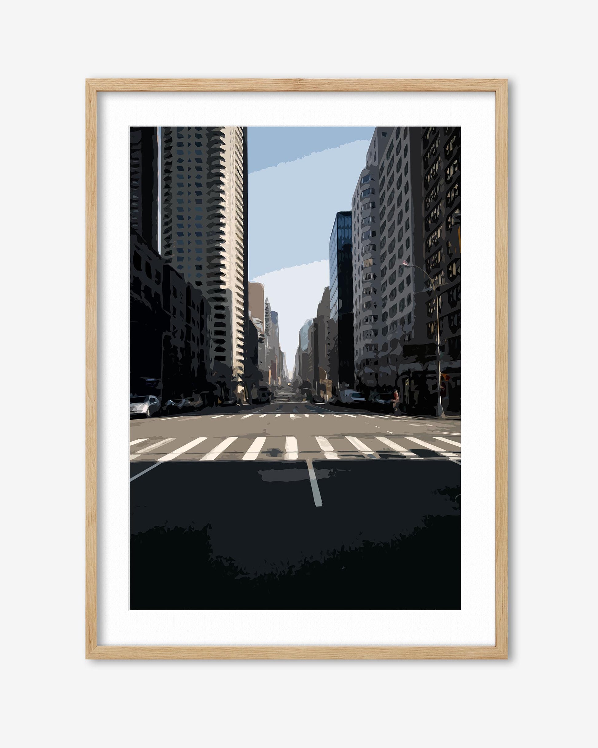 Framed city street with tall buildings and a clear sky