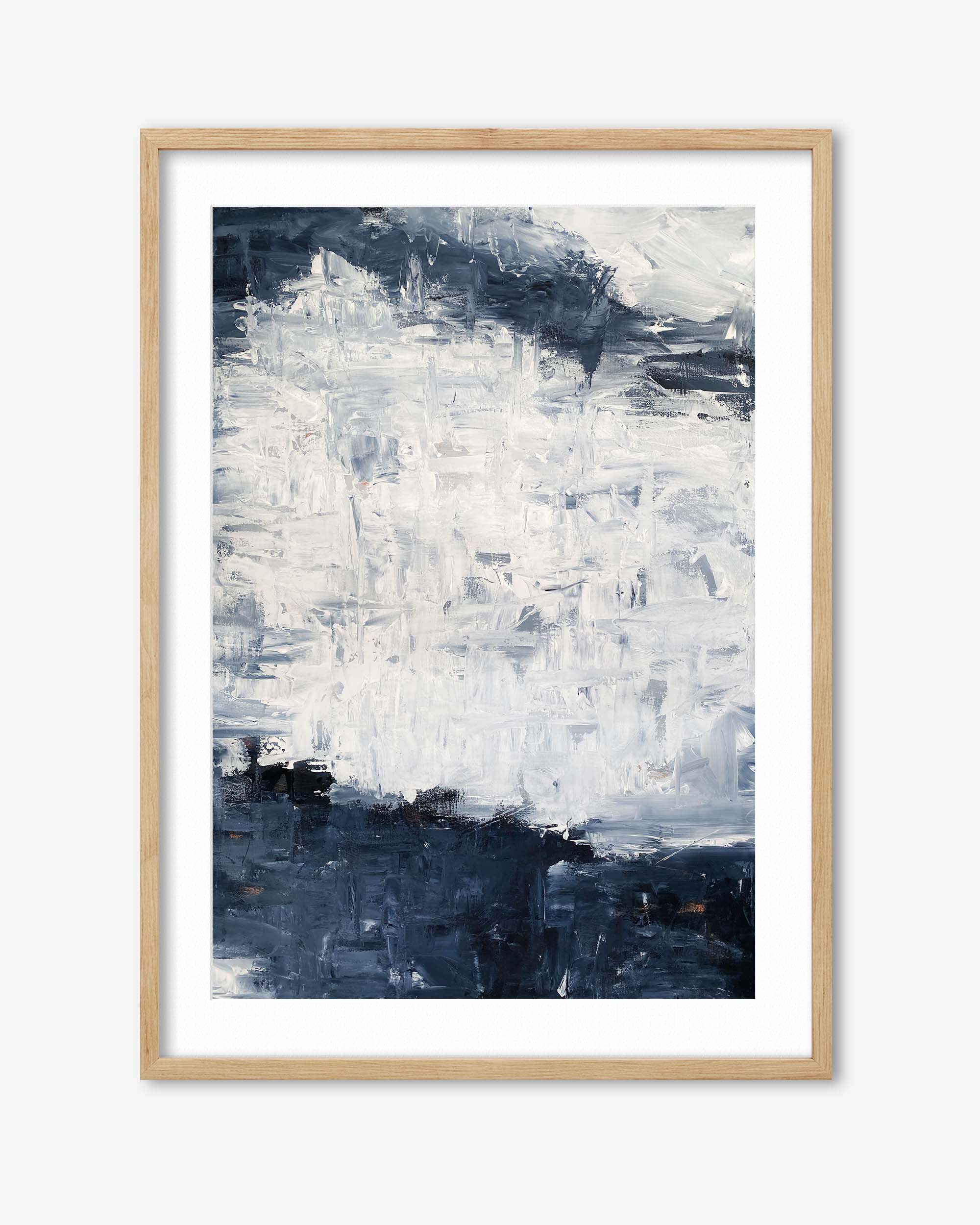 Abstract art print in a wooden frame on a white background