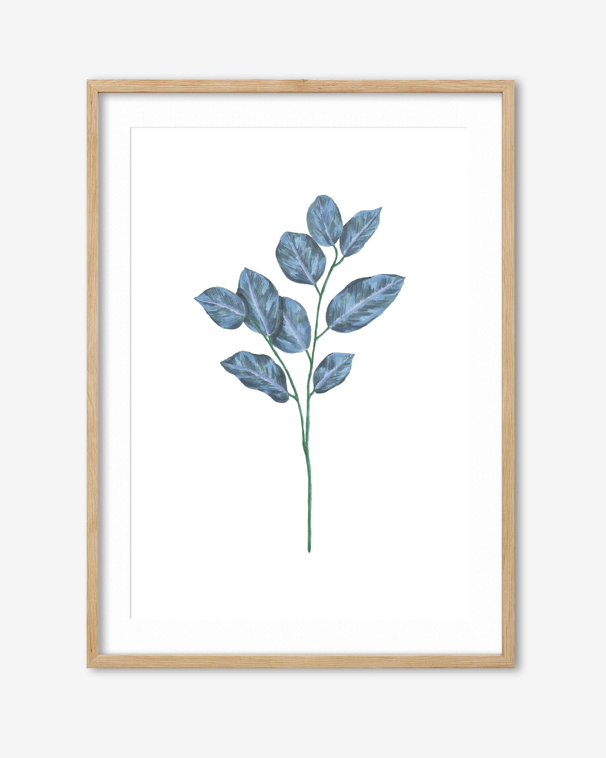 Framed artwork of a blue leaf branch on a white background