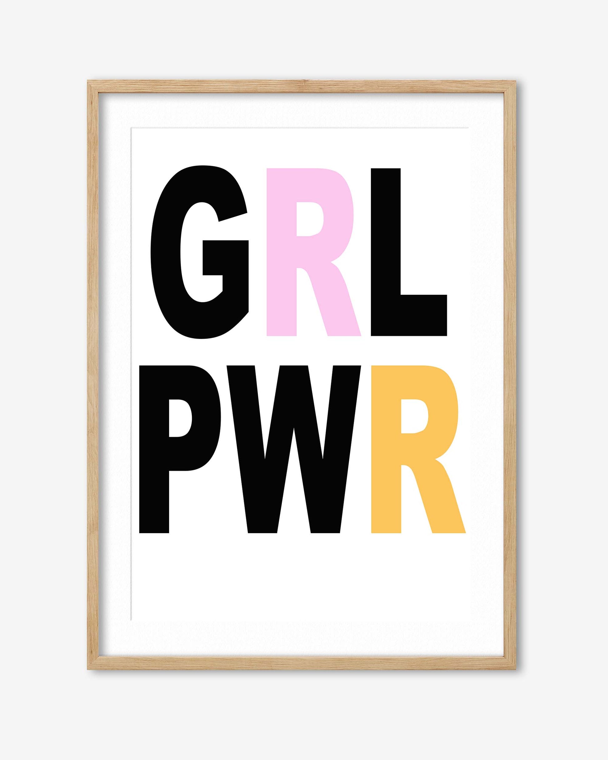 Framed poster with 'GRL PWR' text in black, pink, and yellow on a white background