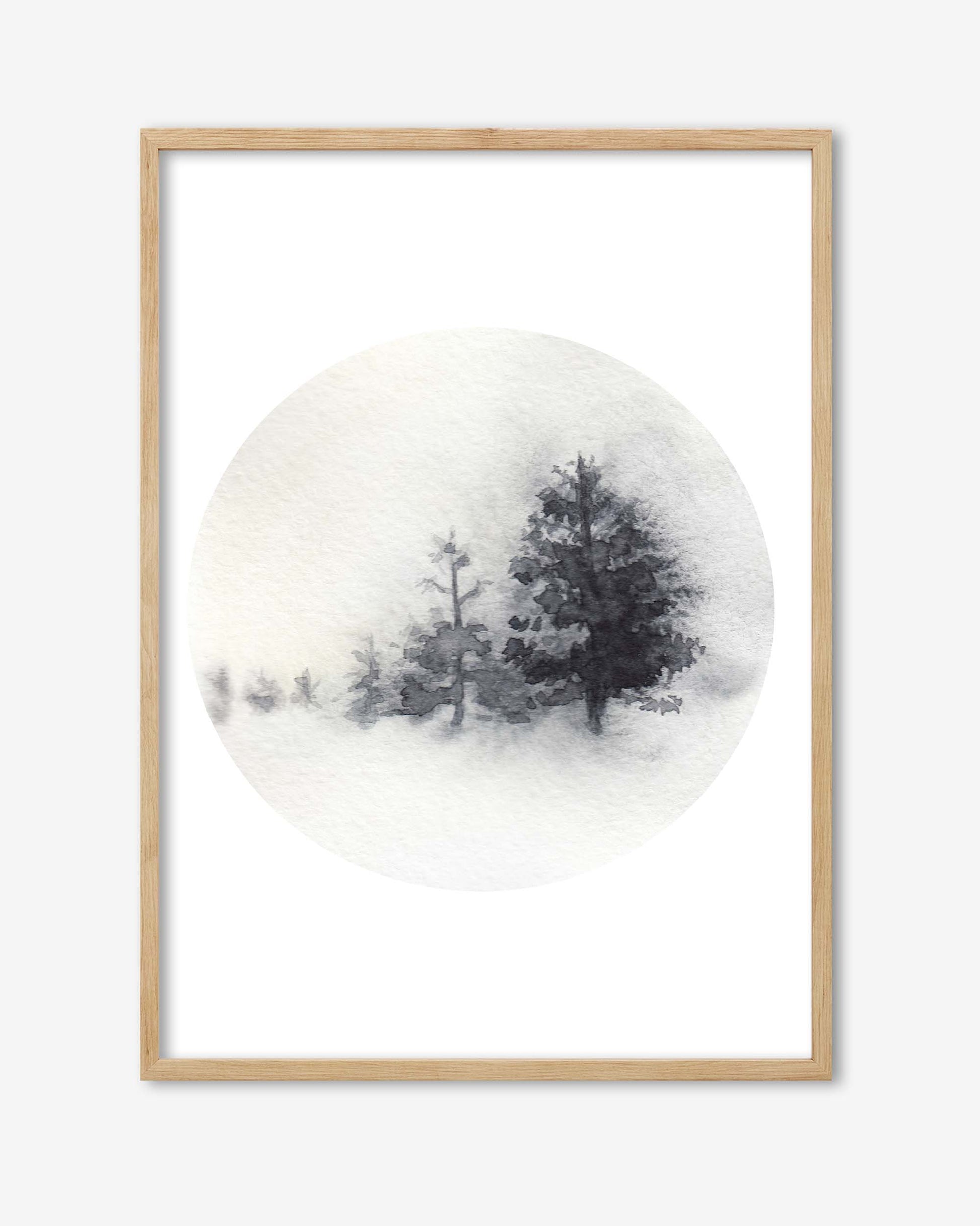 Framed artwork of trees on a snowy background