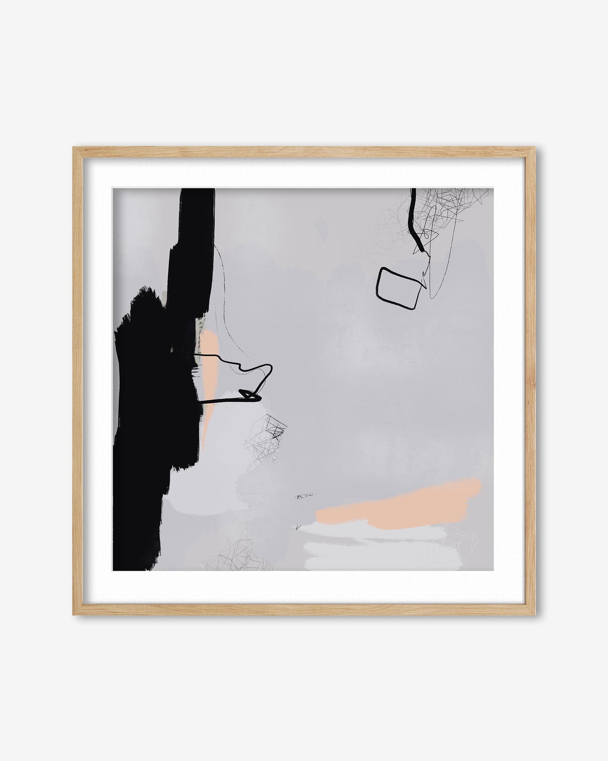 Abstract art print with black, pink, and gray shapes in a wooden frame on a white background