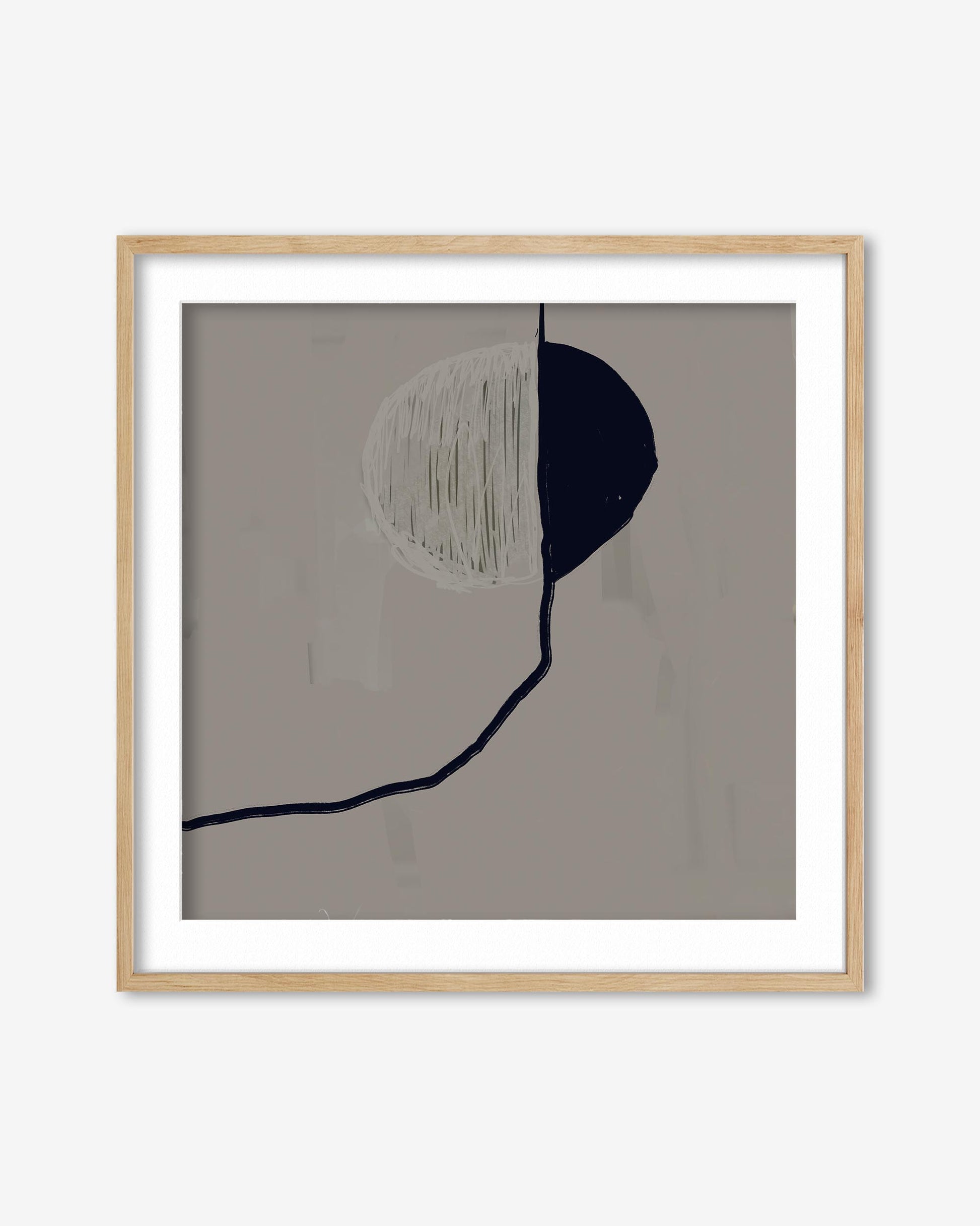 Framed abstract art with two shapes on a gray background