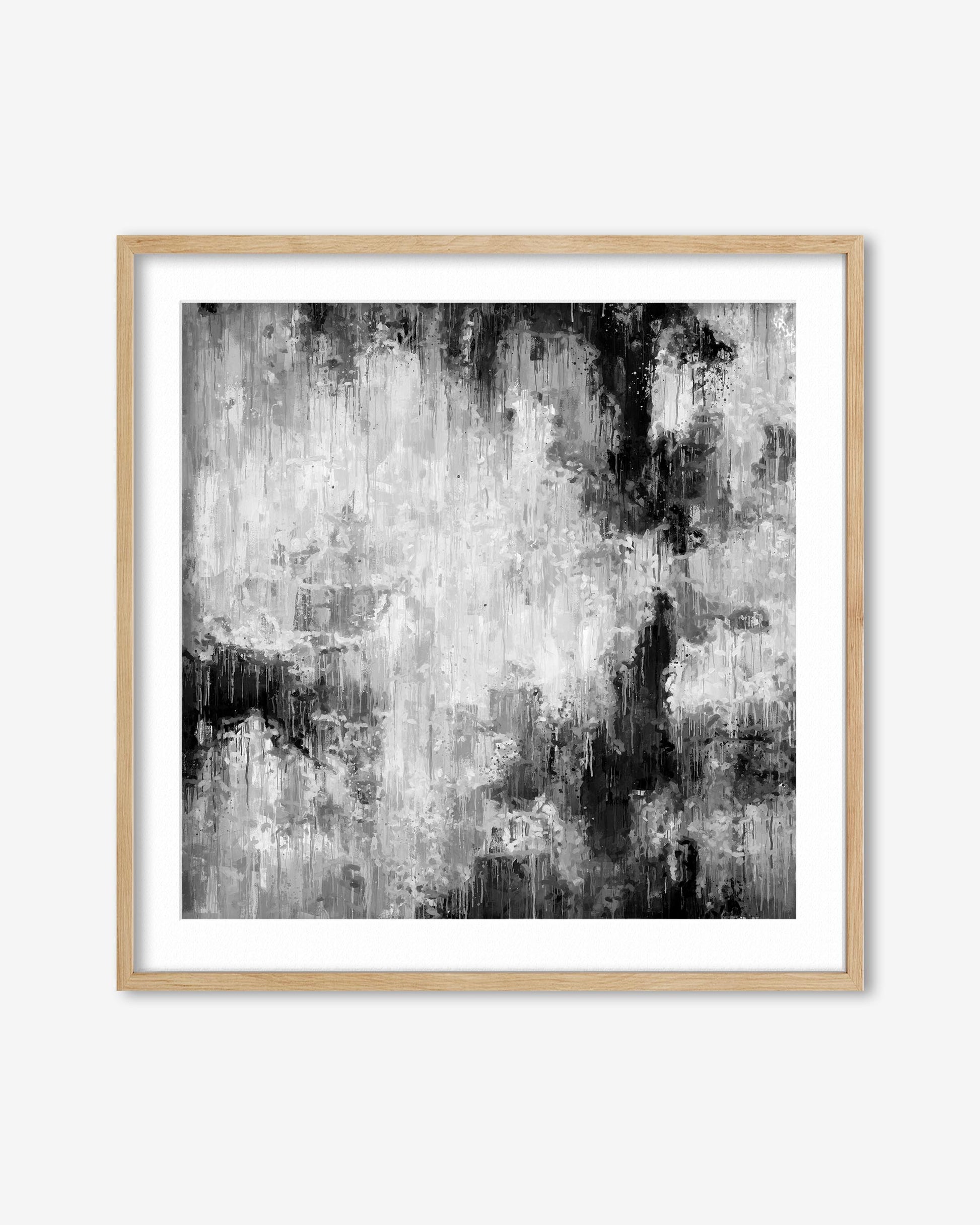Framed abstract art print with black and gray brushstrokes on a white background