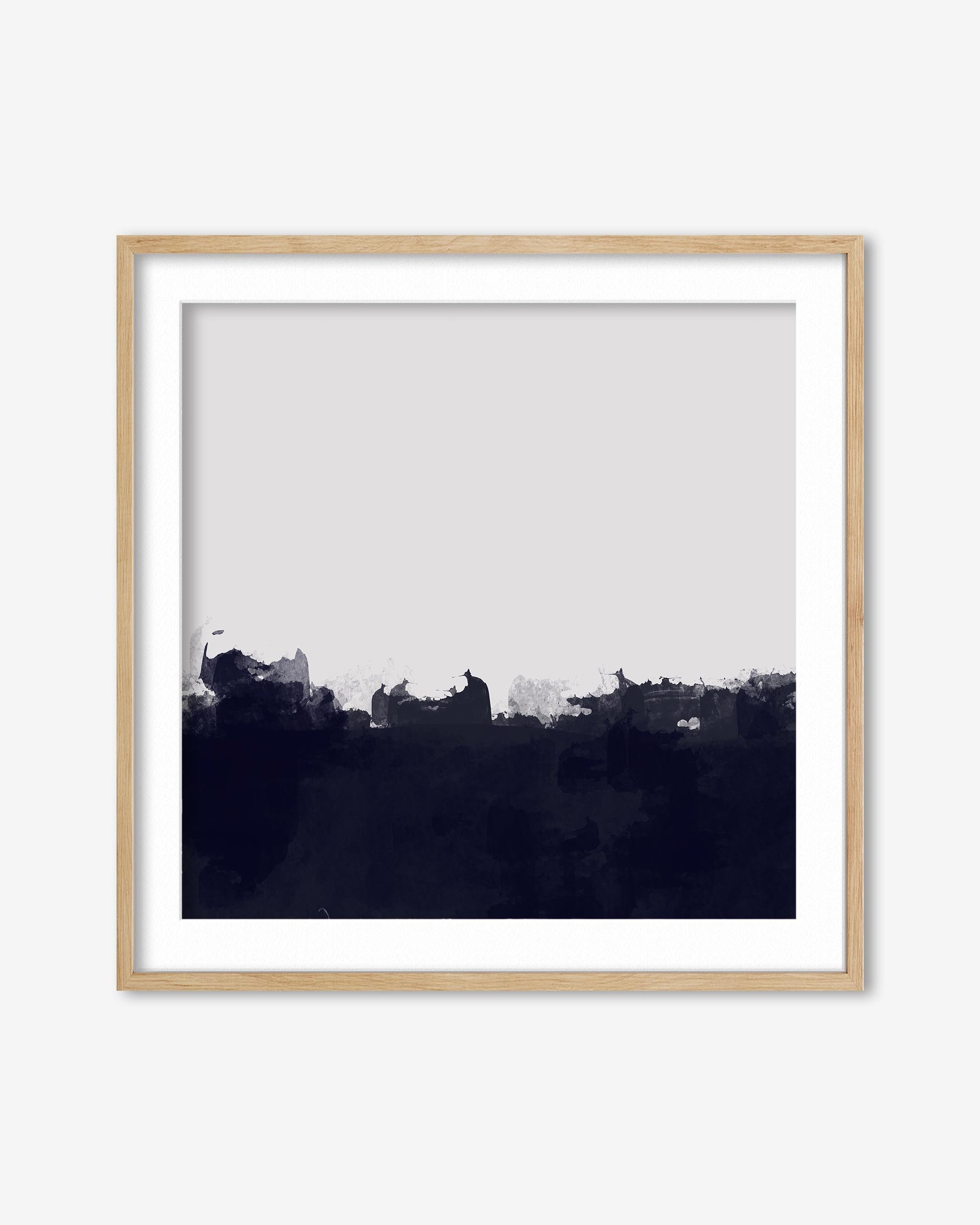 Framed artwork with a black and white abstract design on a white background