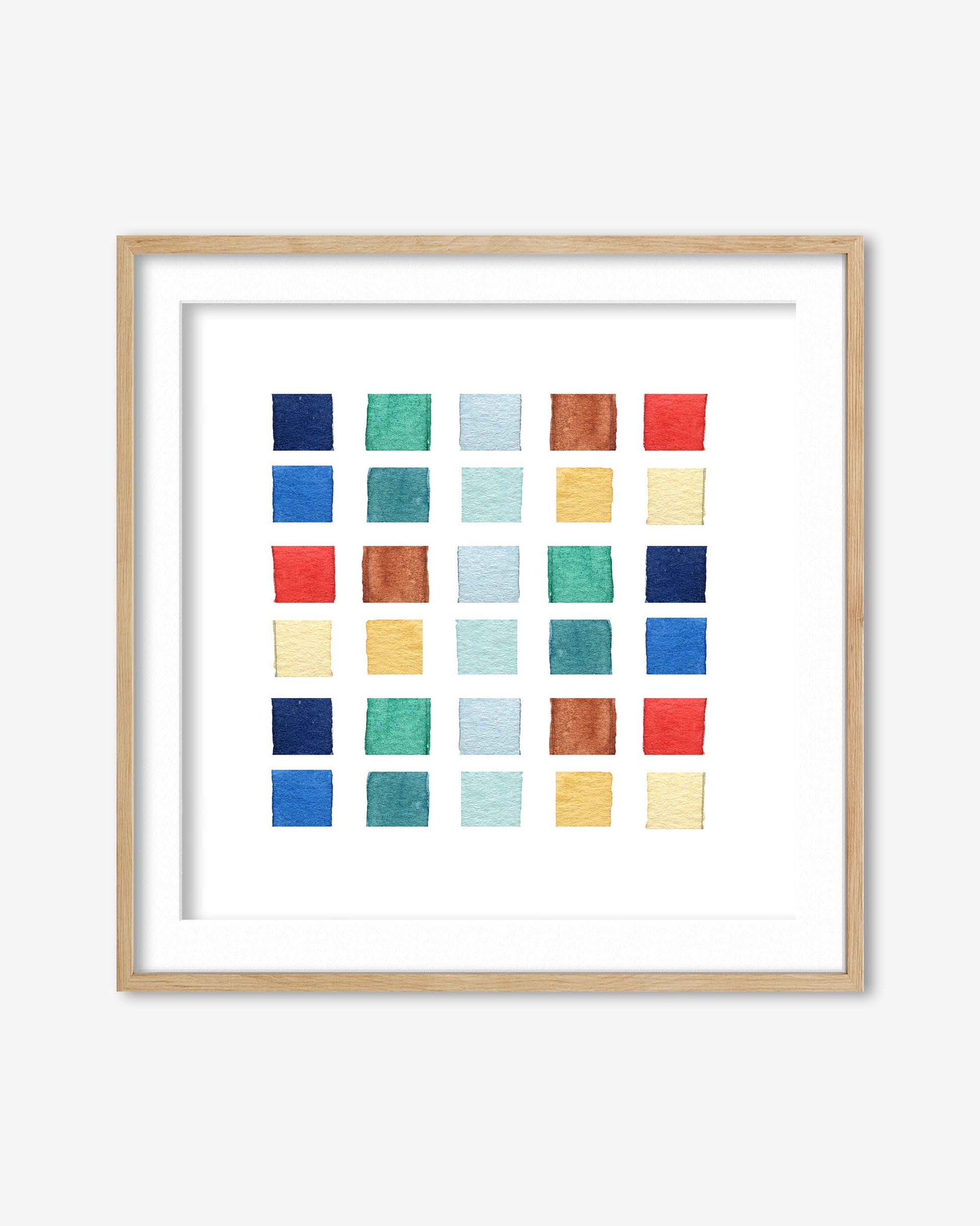 Framed artwork with a grid of colorful squares on a white background
