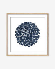 Framed artwork with a navy blue floral design on a white background